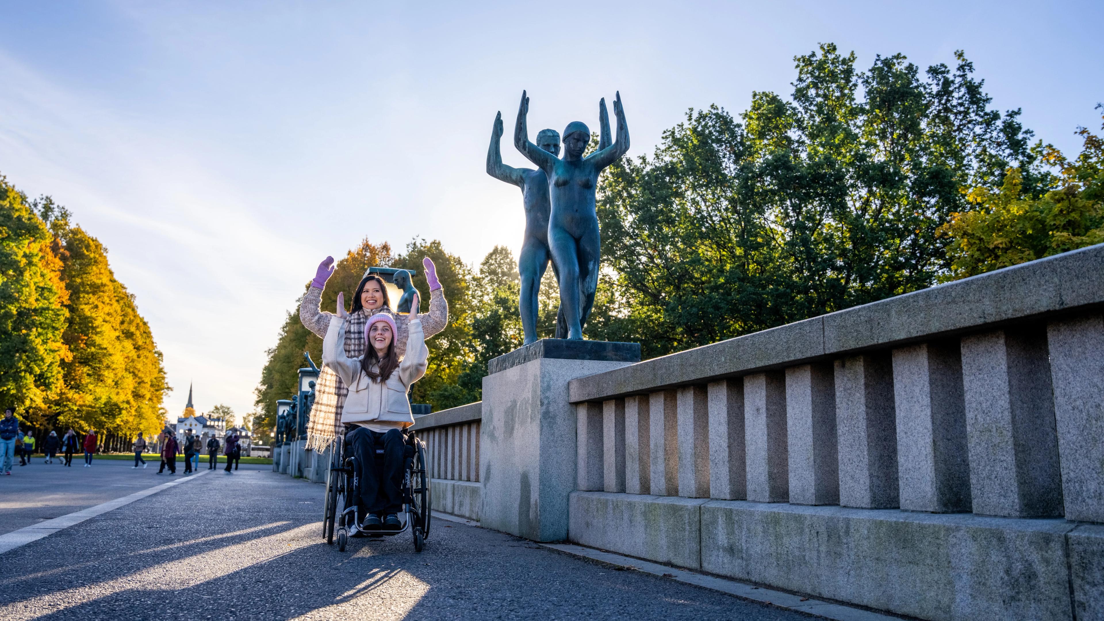 Two girls in Vigelandsparken at Frogner in Oslo, Eastern Norway