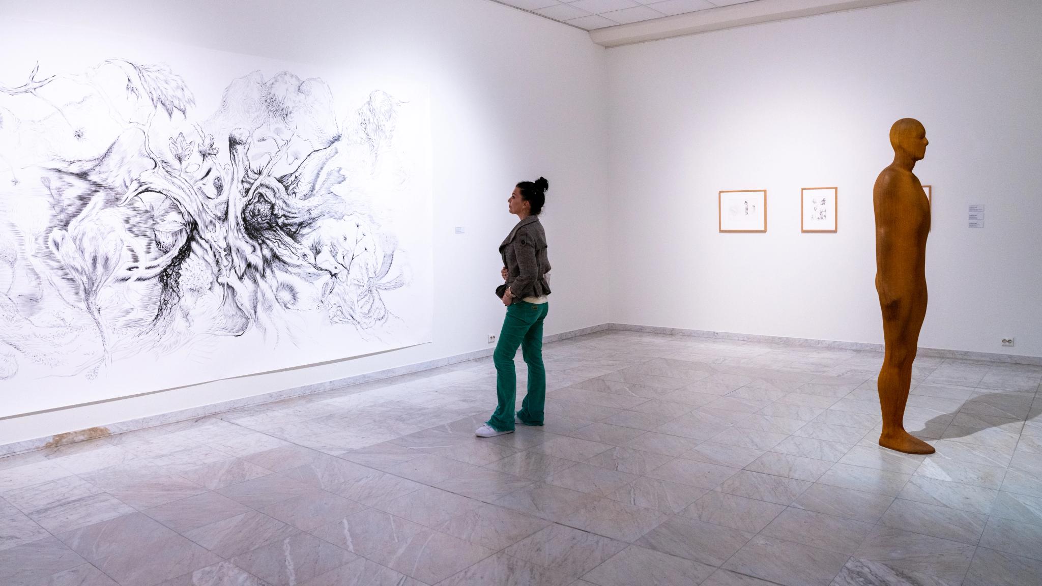 A women looks at art from at the Stavanger Kunstmuseum