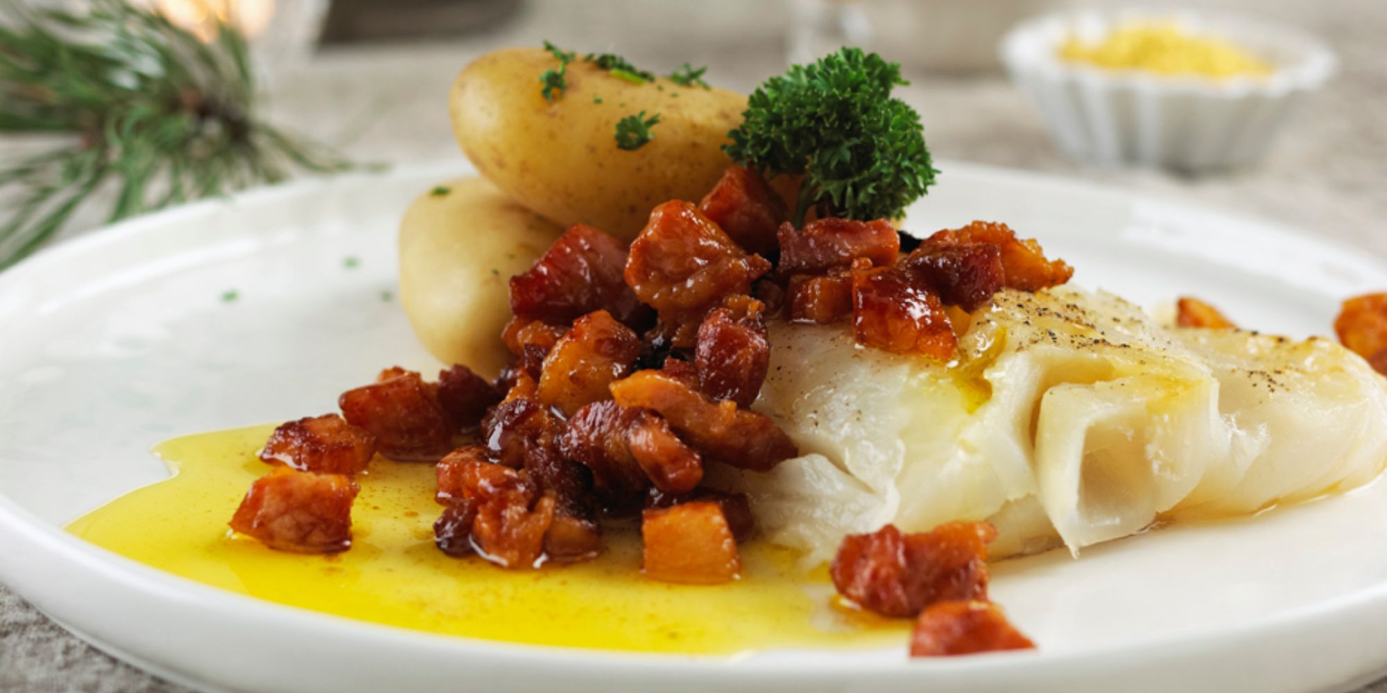 A serving of lutefisk with bacon and potatoes