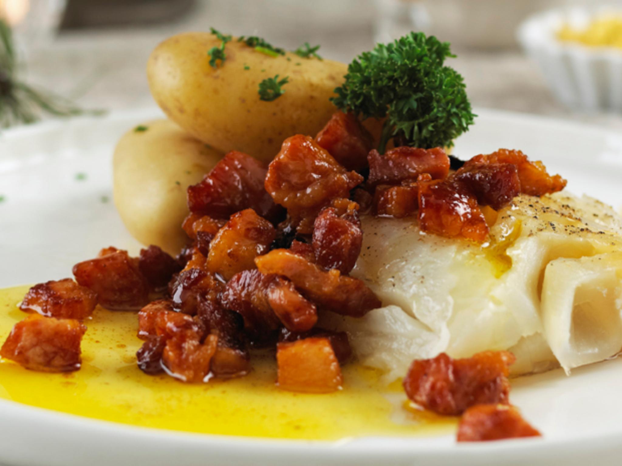 A serving of lutefisk with bacon and potatoes