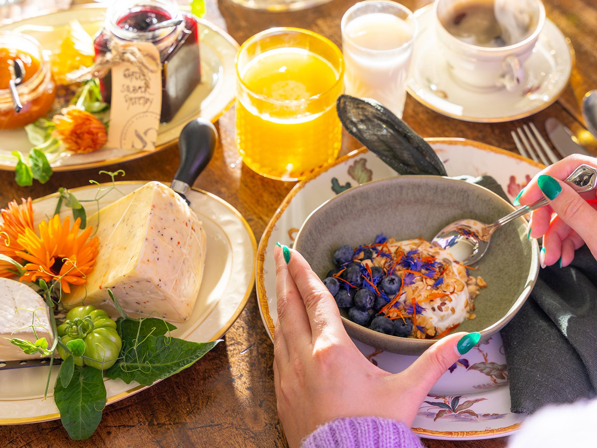 Cheeses, juice and a very nice breakfast.