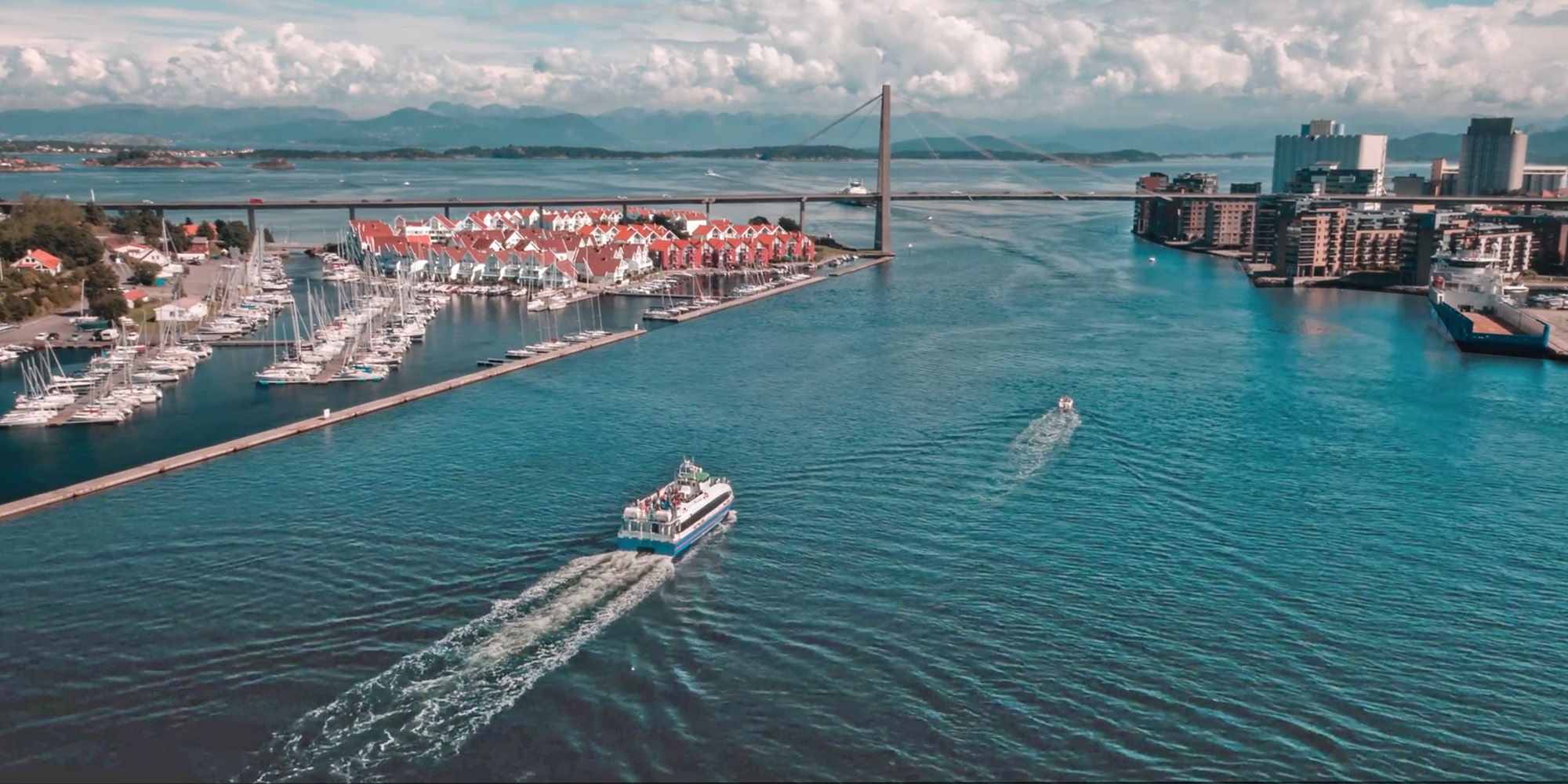 A ferry sailing towards Stavanger city centre in Fjord Norway