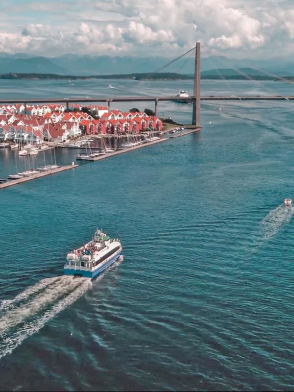 A ferry sailing towards Stavanger city centre in Fjord Norway