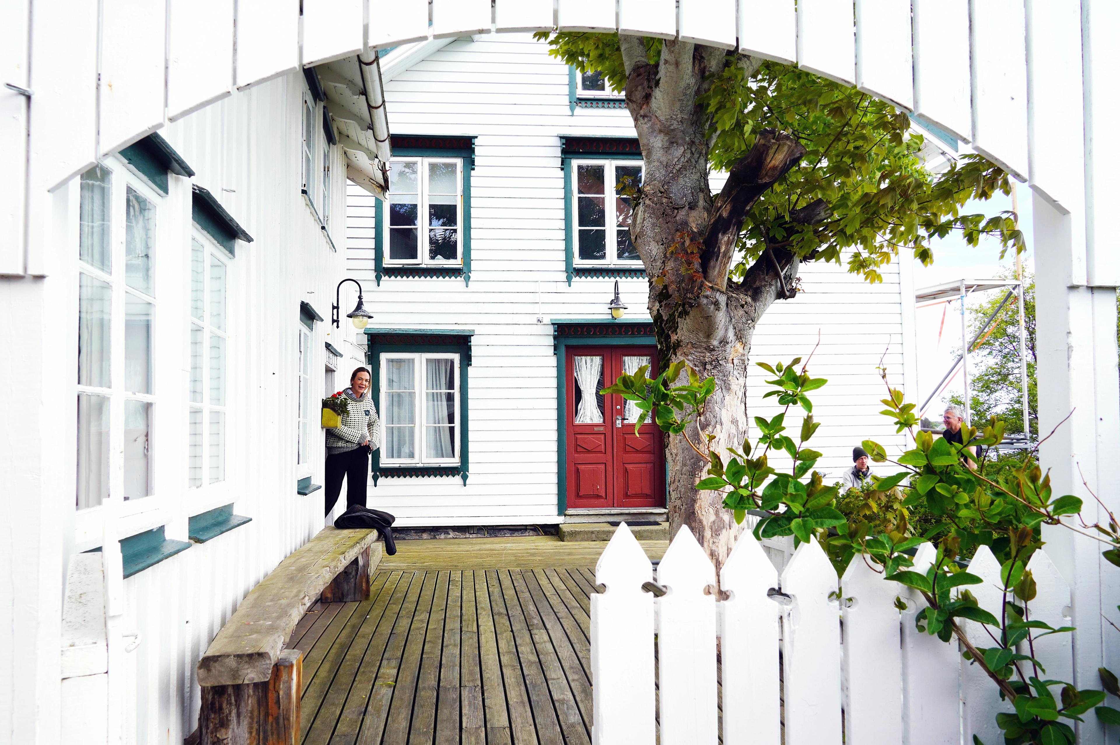 Håholmen Havstuer - a white wooden hotel on an island by the sea
