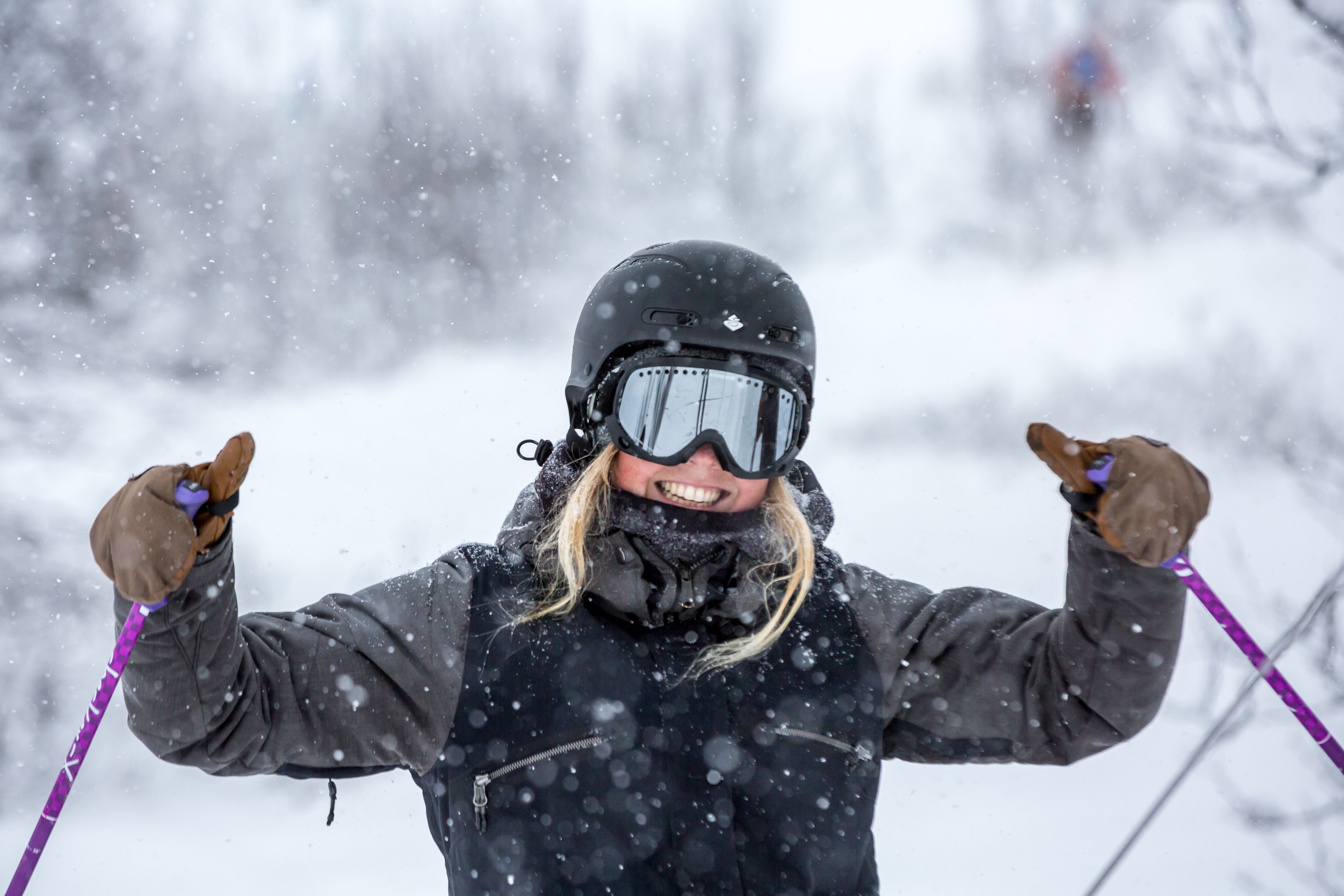A female skier cheering in the Geilo ski resort