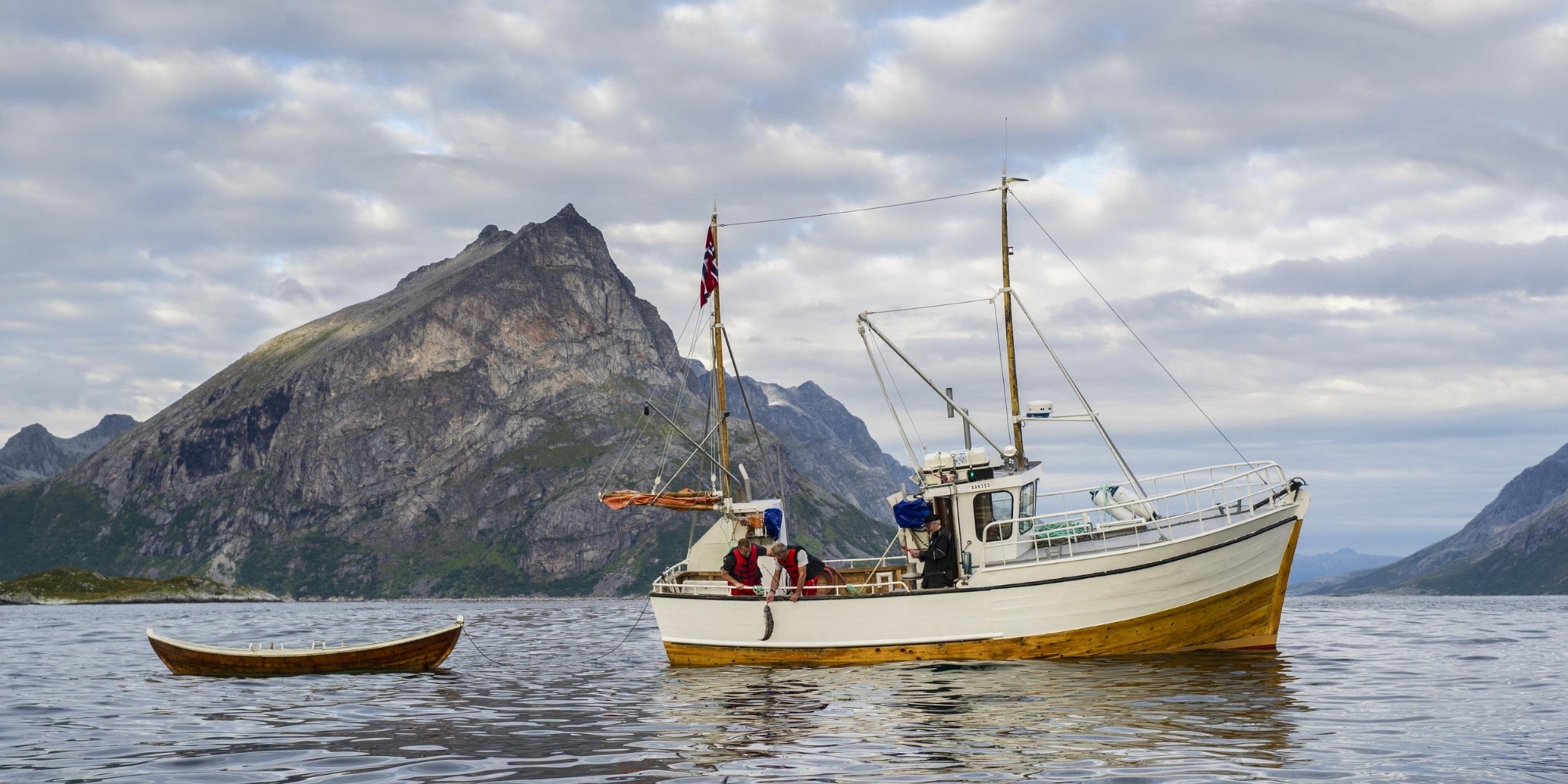 An old fishing boat on the sea in the Tromsø area in Northern Norway