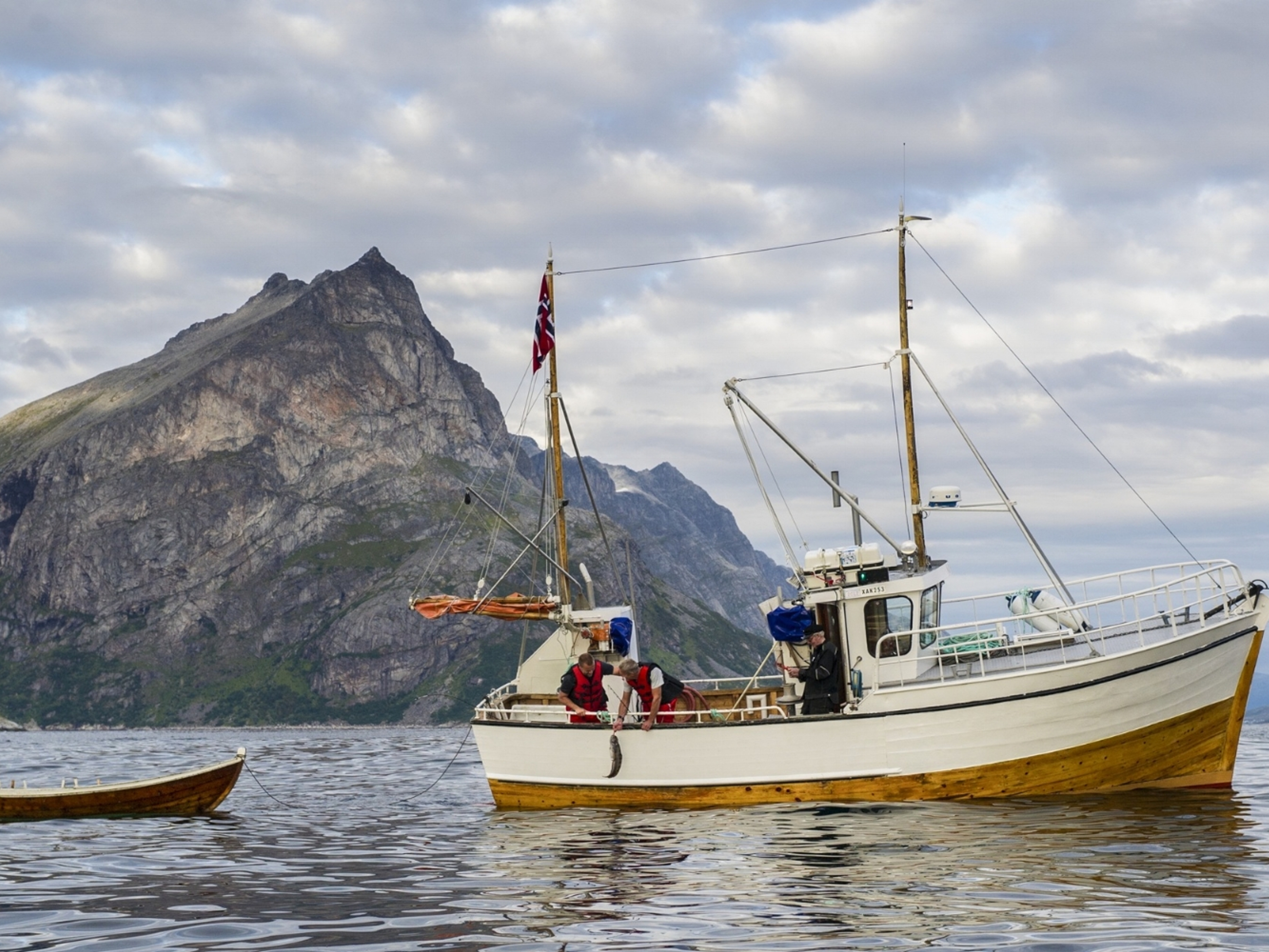 An old fishing boat on the sea in the Tromsø area in Northern Norway