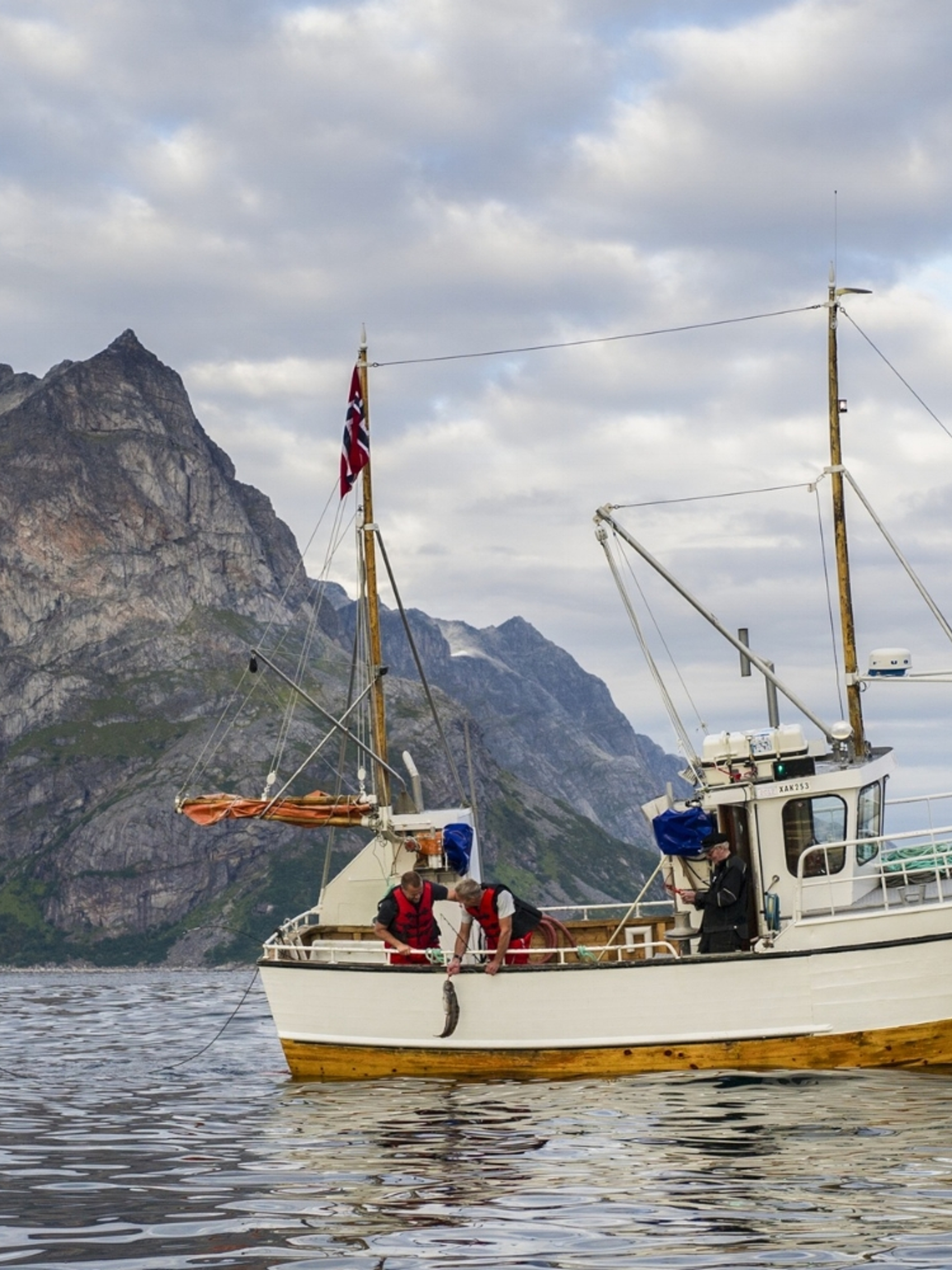 An old fishing boat on the sea in the Tromsø area in Northern Norway