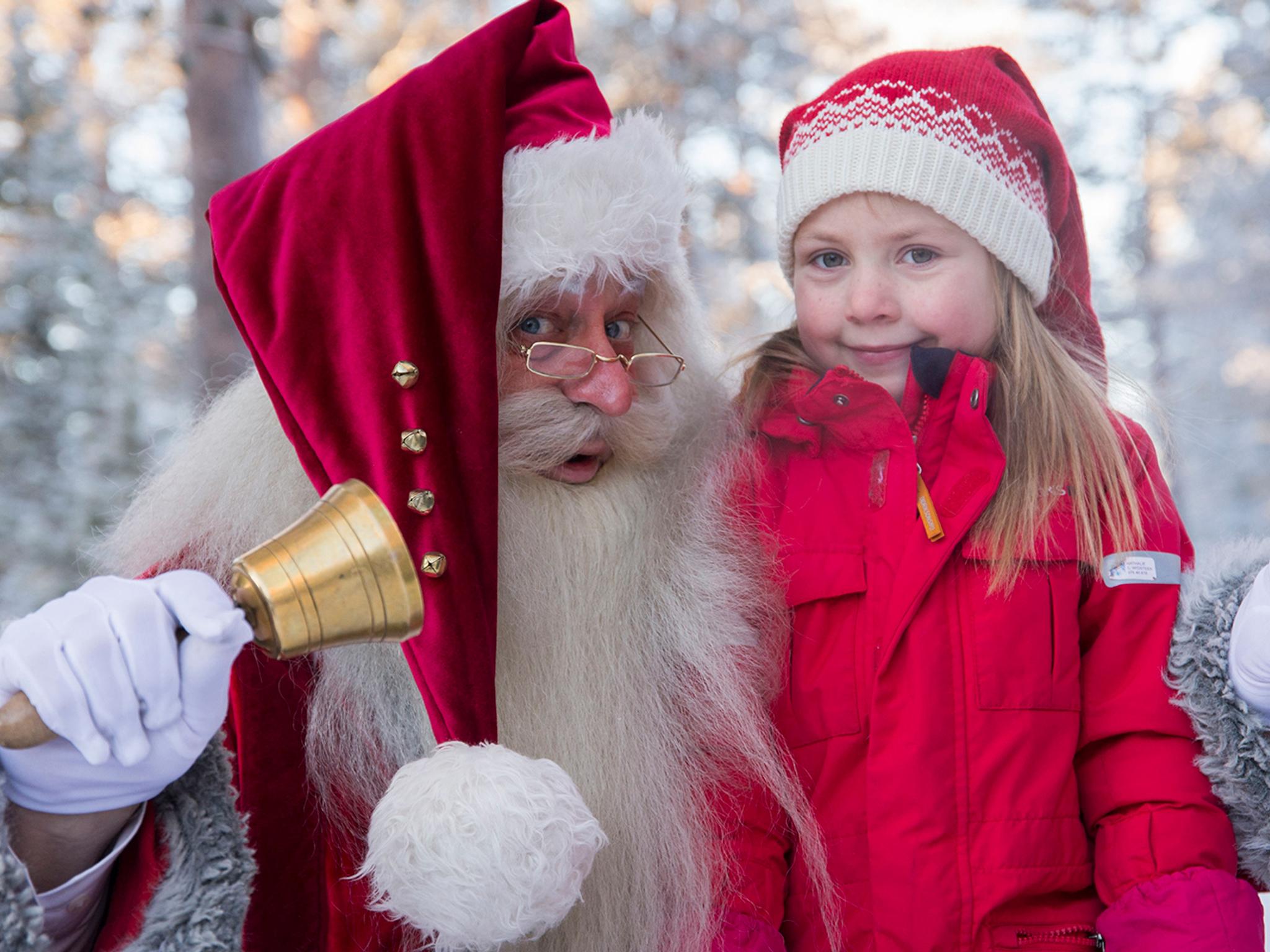 Santa Claus and a girl at one of Norway’s top Christmas destinations, Savalen