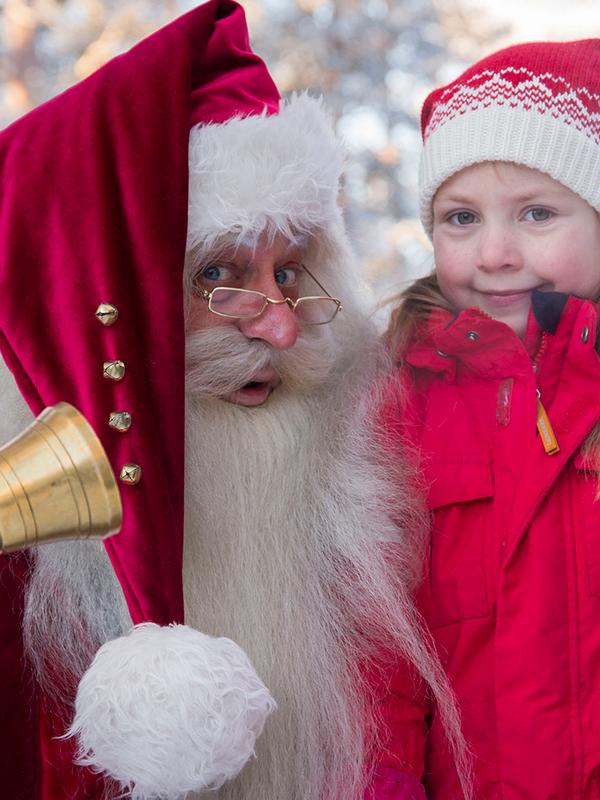 Santa Claus and a girl at one of Norway’s top Christmas destinations, Savalen