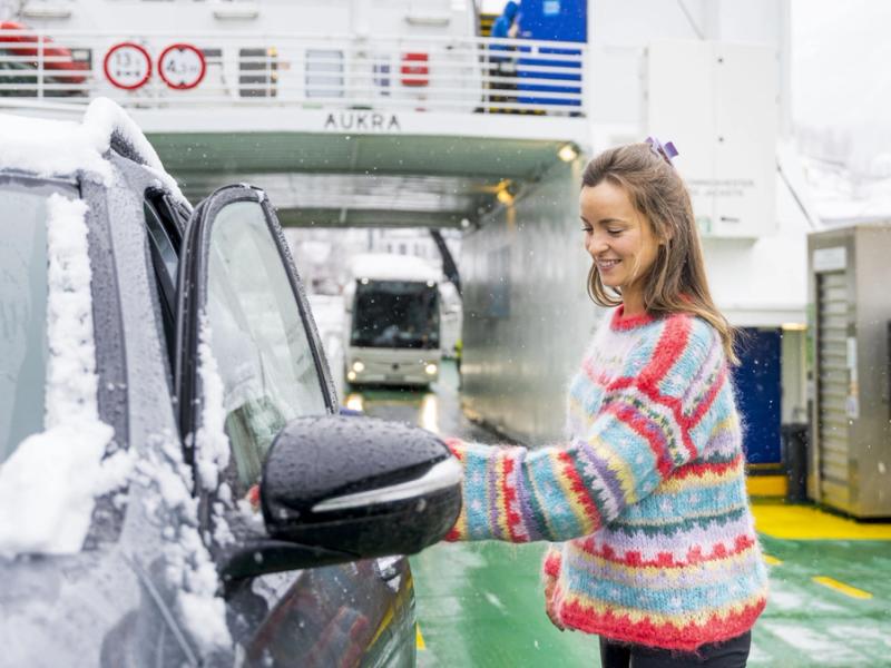 Woman entering car on the Fram ferry between Geiranger and Hellesylt