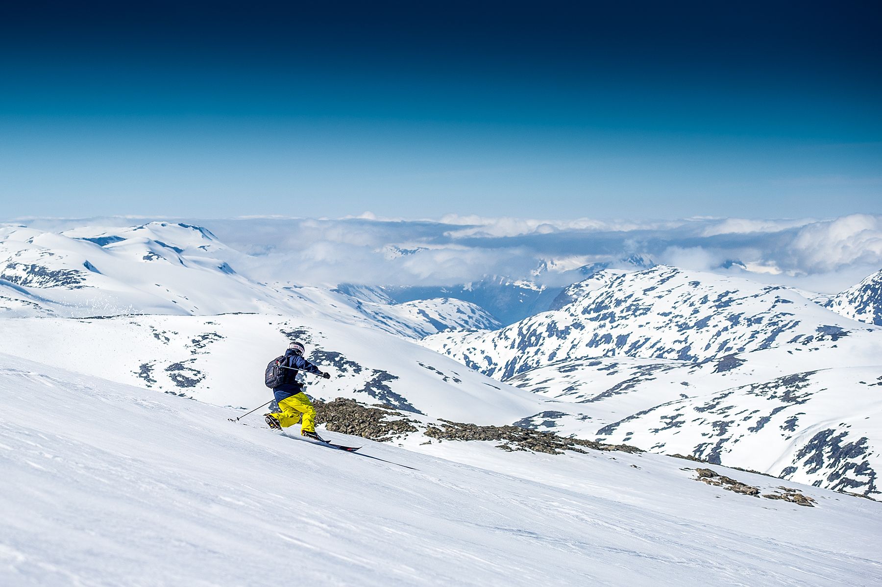 A person is skiing in summer at Stryn Sommerki in Stryn in Nordfjord, Fjord Norway