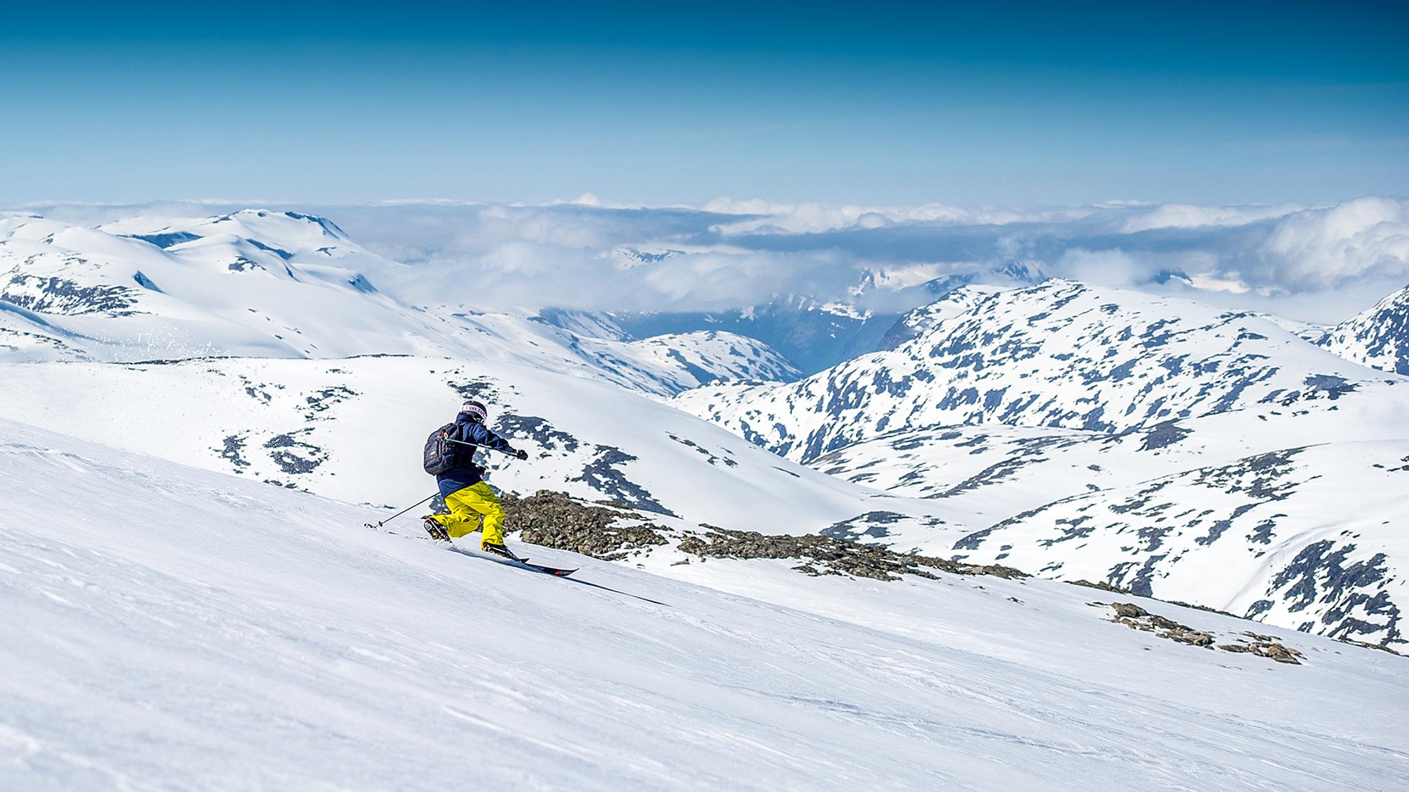 A person is skiing in summer at Stryn Sommerki in Stryn in Nordfjord, Fjord Norway