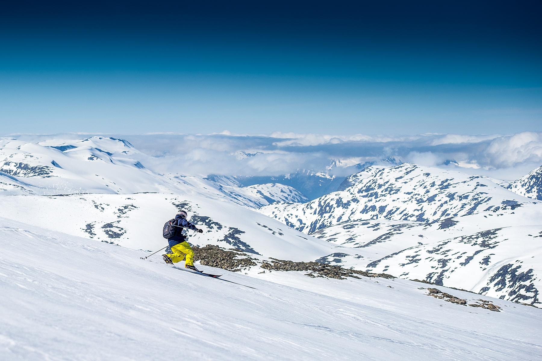 A person is skiing in summer at Stryn Sommerki in Stryn in Nordfjord, Fjord Norway