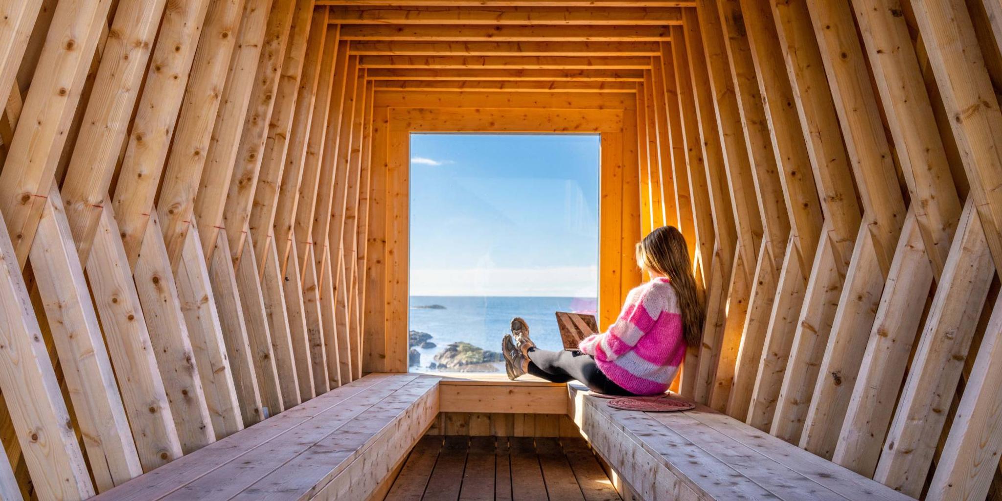 A woman working remotely from Nyksund, in stunning scenery