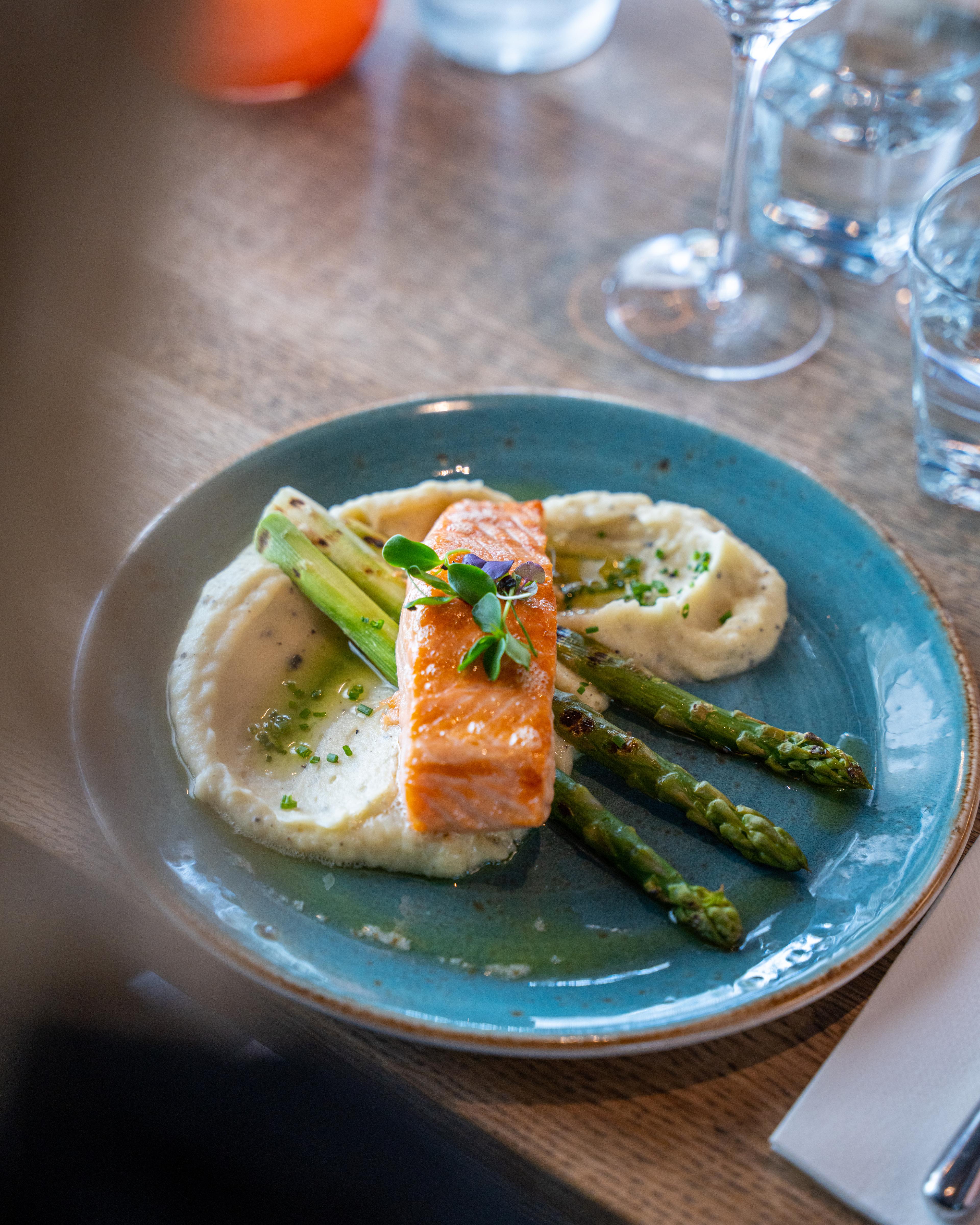 Grilled salmon on a plate at The Salmon, Tjuvholmen in Oslo
