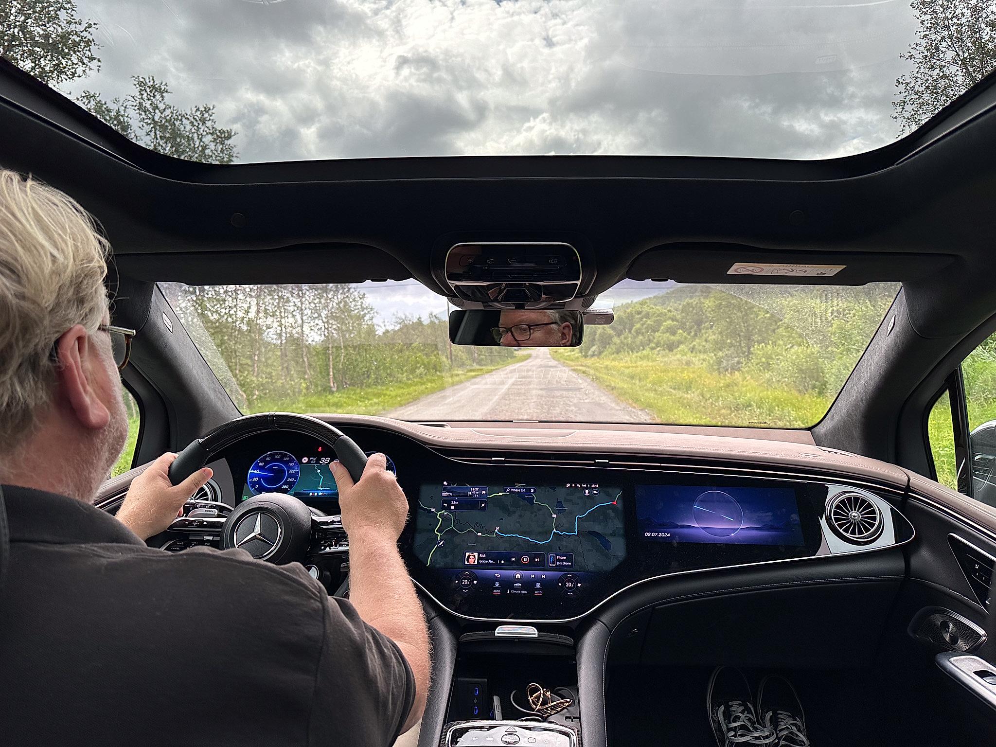 A man driving an electric car in Norway