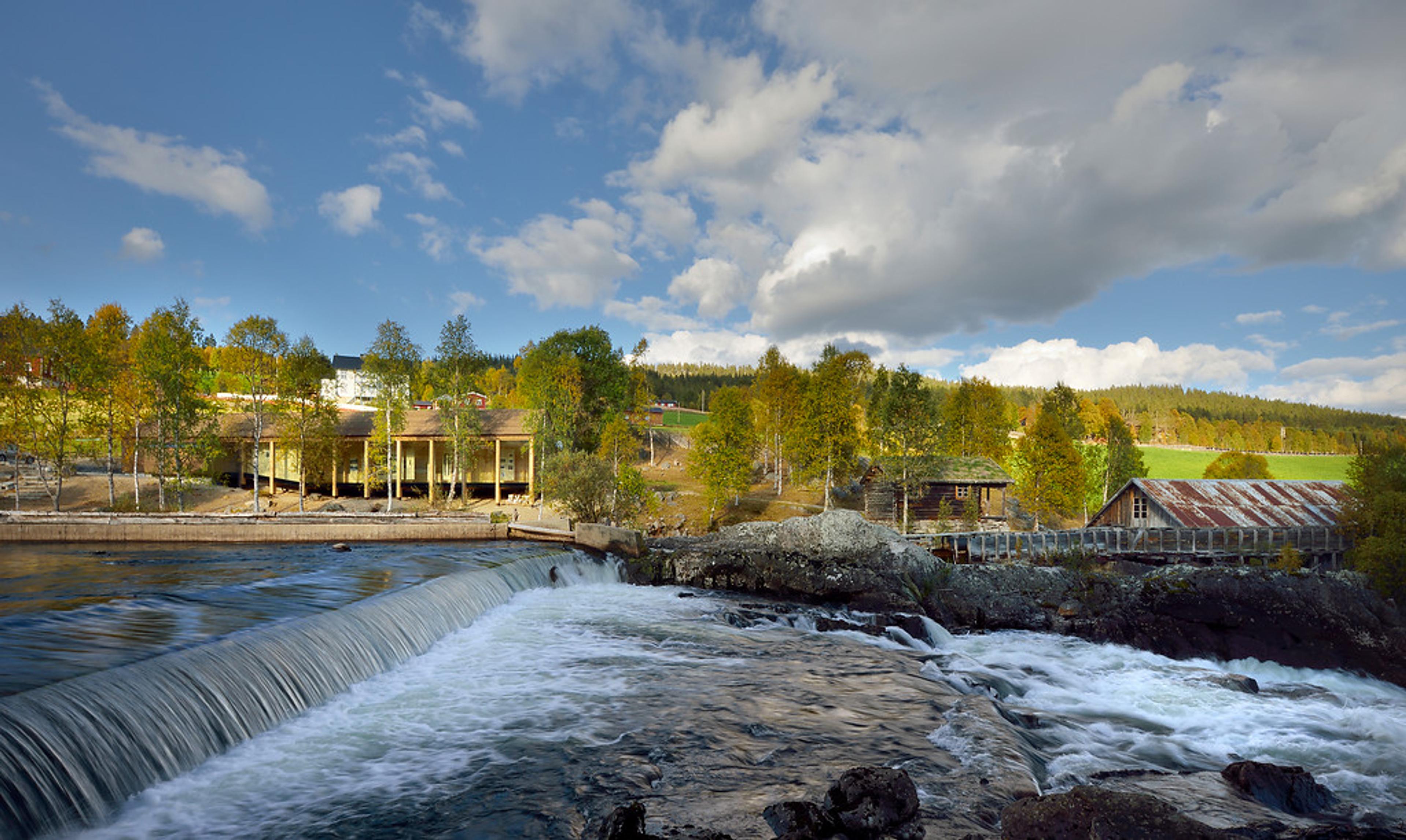 A wooden building with wooden pillars