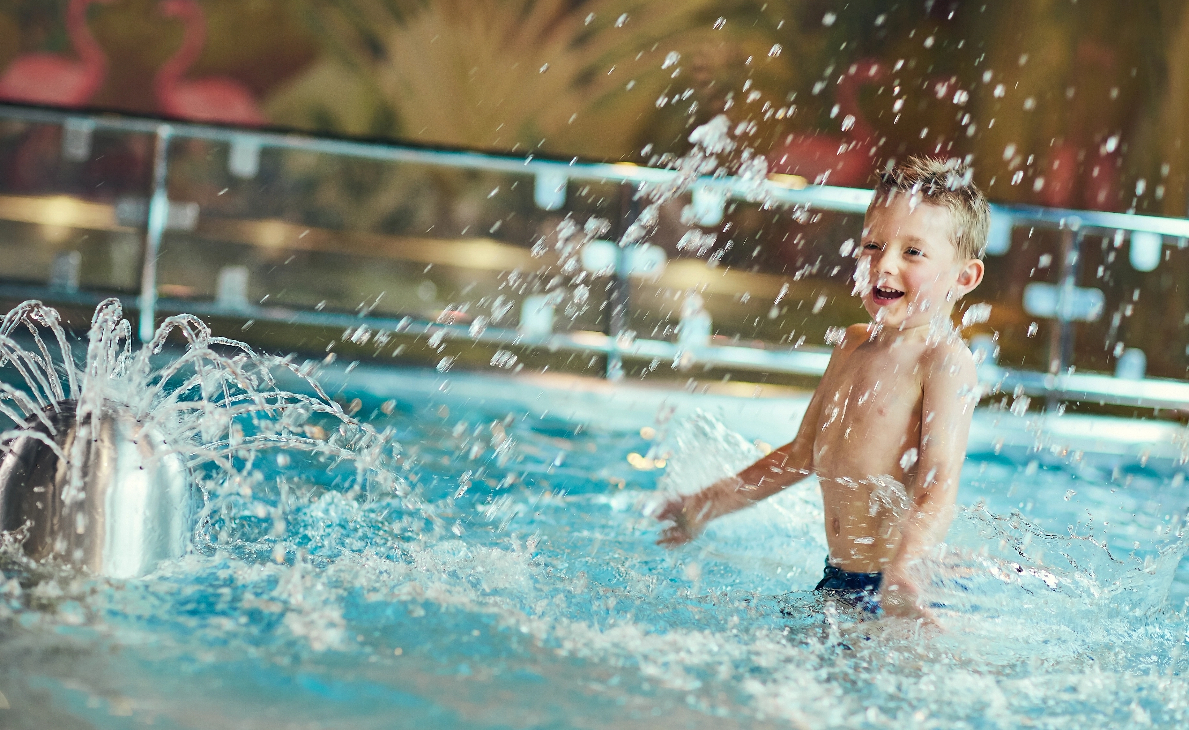 Kid having fun in the pool at Ridderbadet spa, Beitostølen