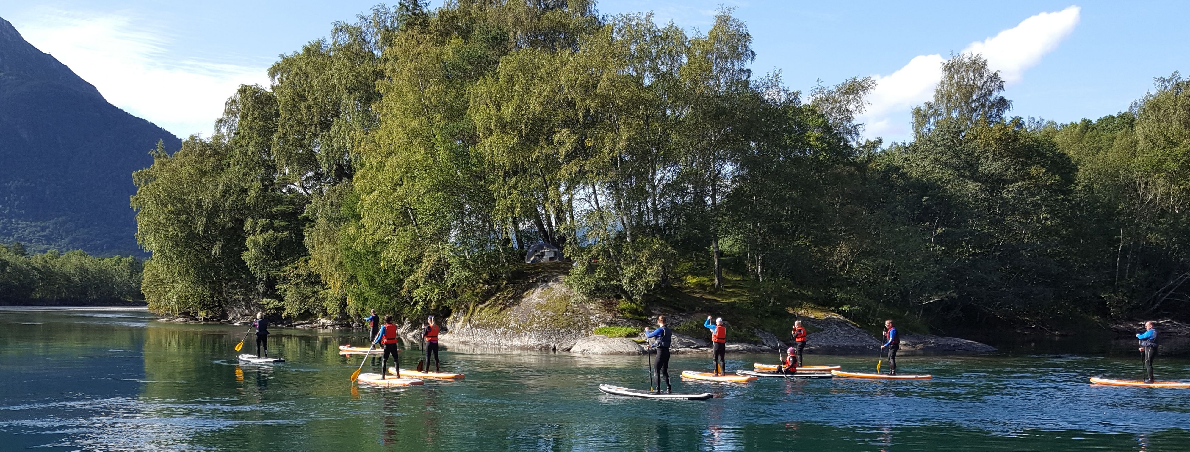 Stand-up paddleboarding on the Istraelva river i Åndalsnes, Northwest Norway