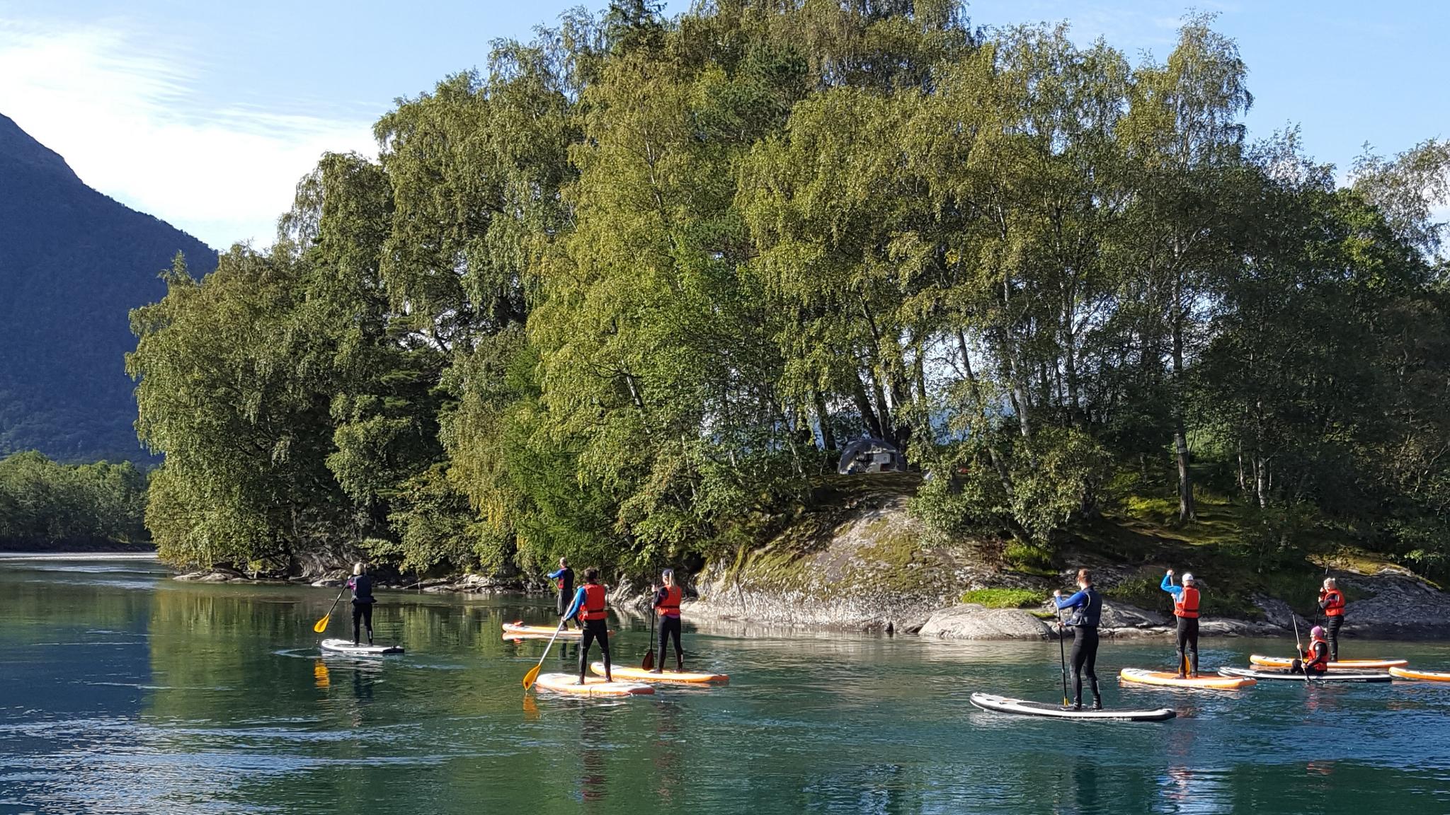 Stand-up paddleboarding on the Istraelva river i Åndalsnes, Northwest Norway