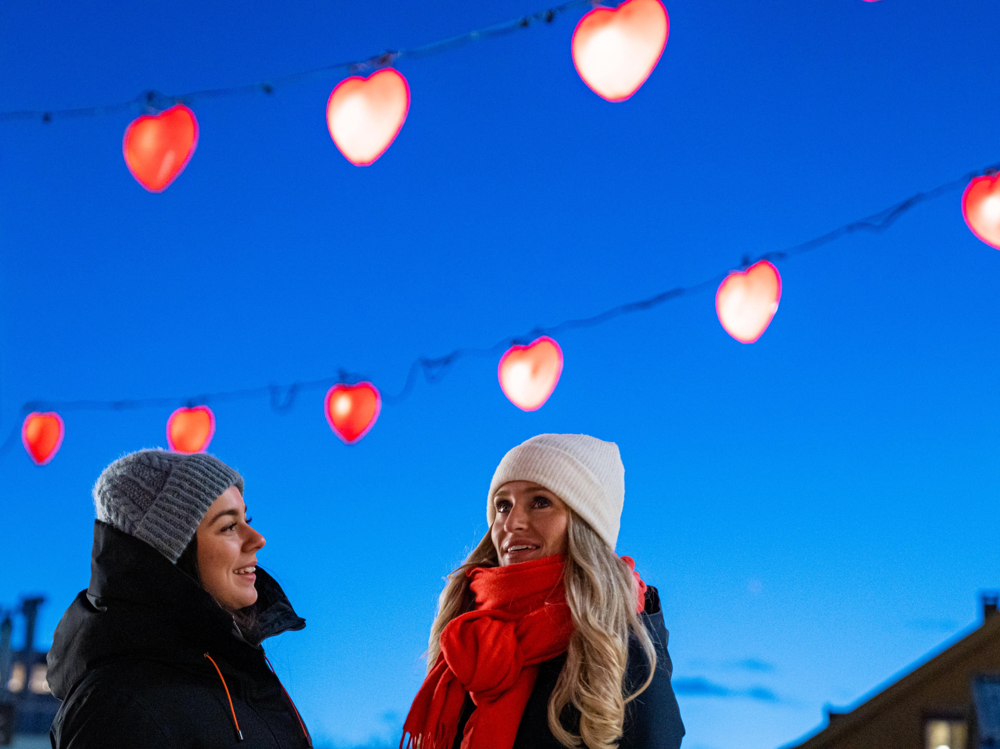 Two girls in the heart street in Tromsø