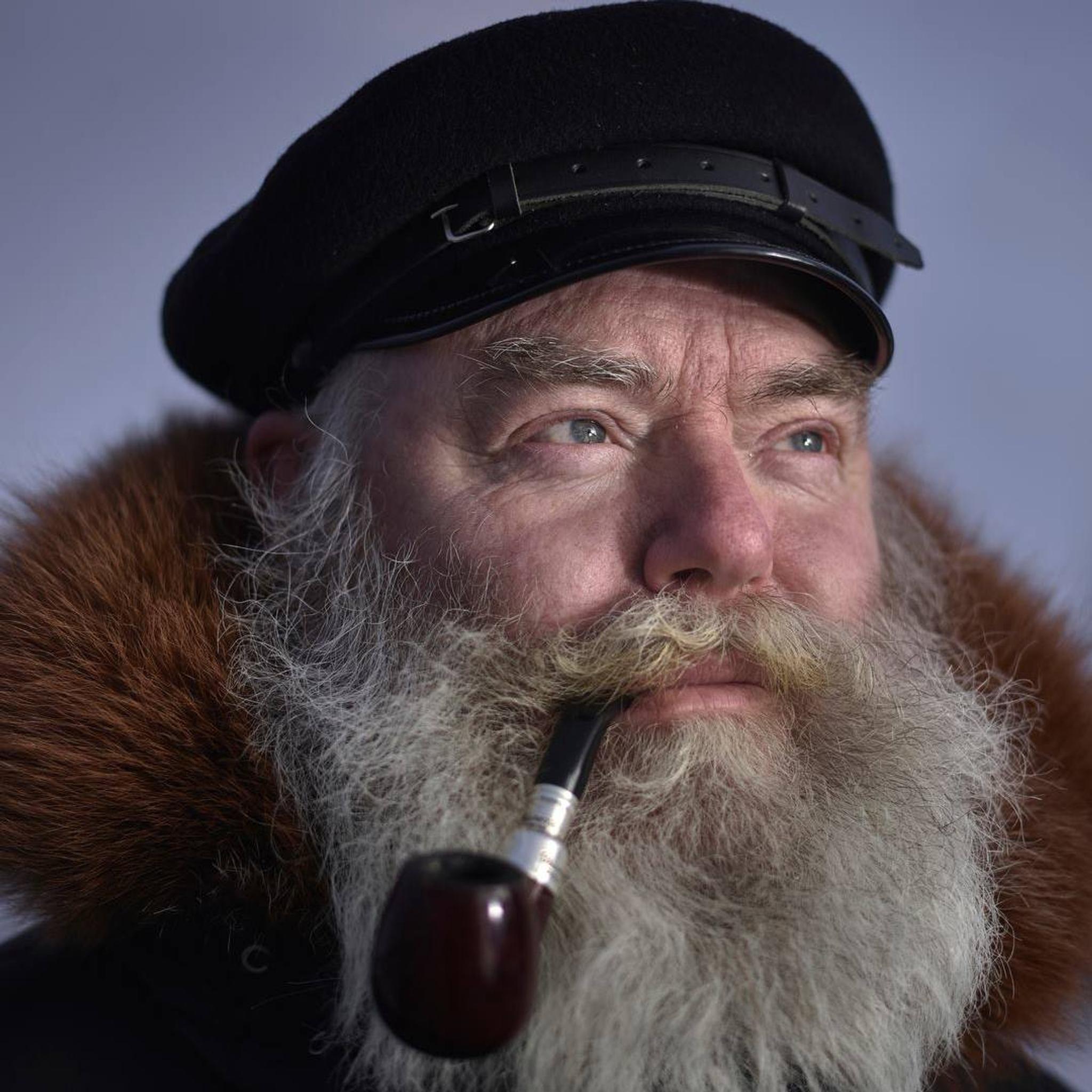 Wiggo Antonsen with a pipe in his mouth on Svalbard in Northern Norway