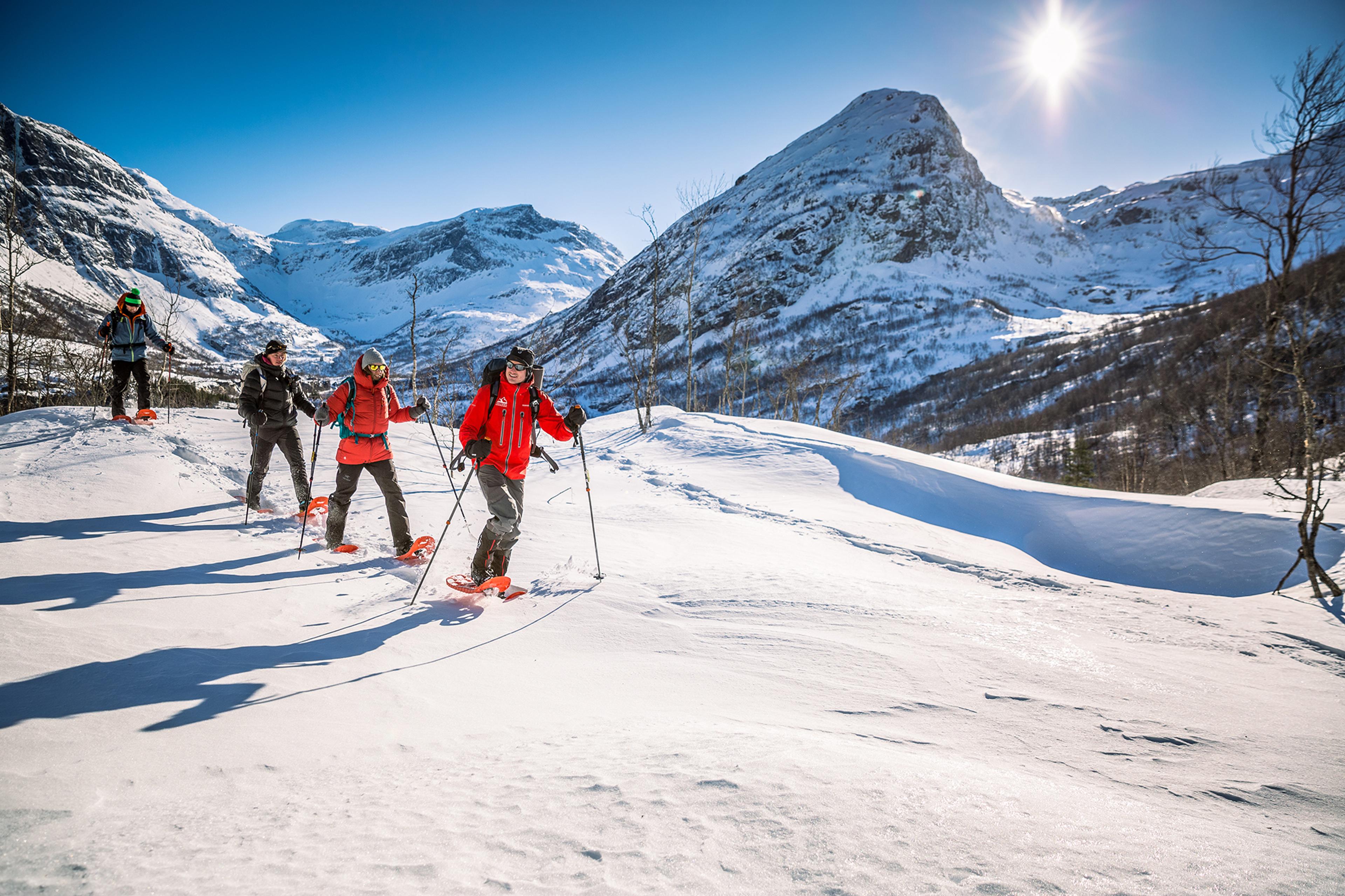 People snowshoeing in Møre og Romsdal, Fjord Norway