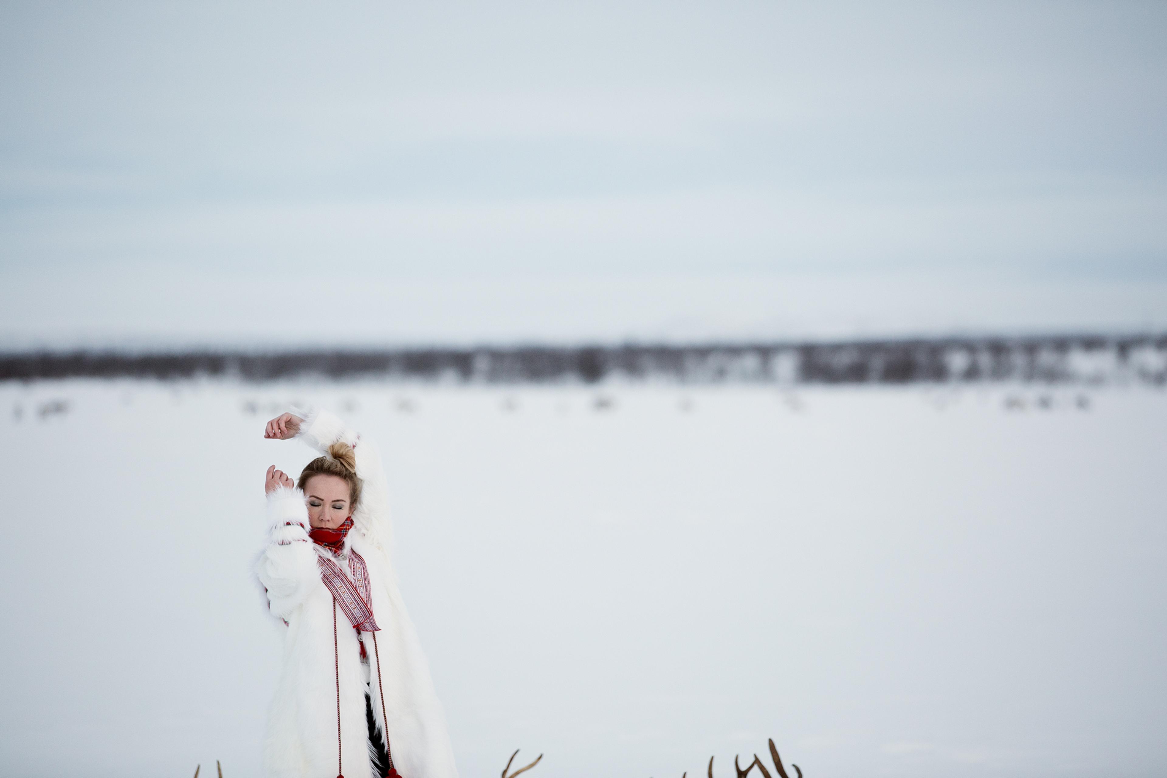 The Sami artist Elle Márjá Eira outside during winter in Northern Norway.