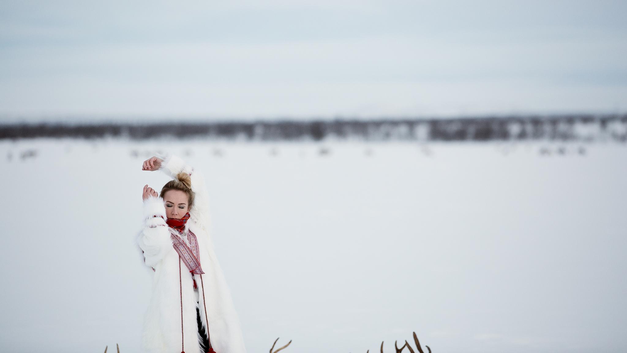 The Sami artist Elle Márjá Eira outside during winter in Northern Norway.