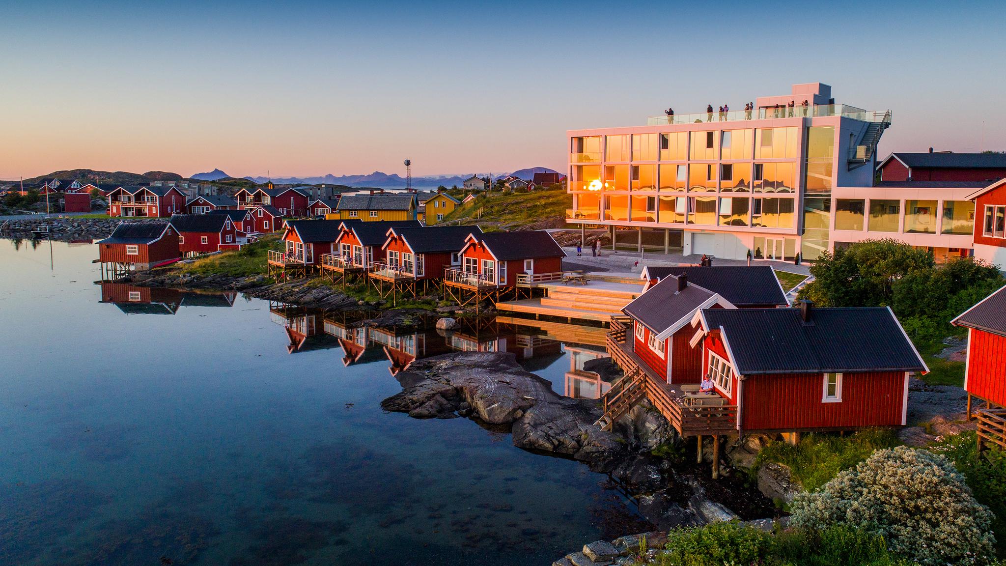 Lovund hotel and fisherman’s cabins at the island Lovund. Kystriksveien in Helgeland, Northern Norway.