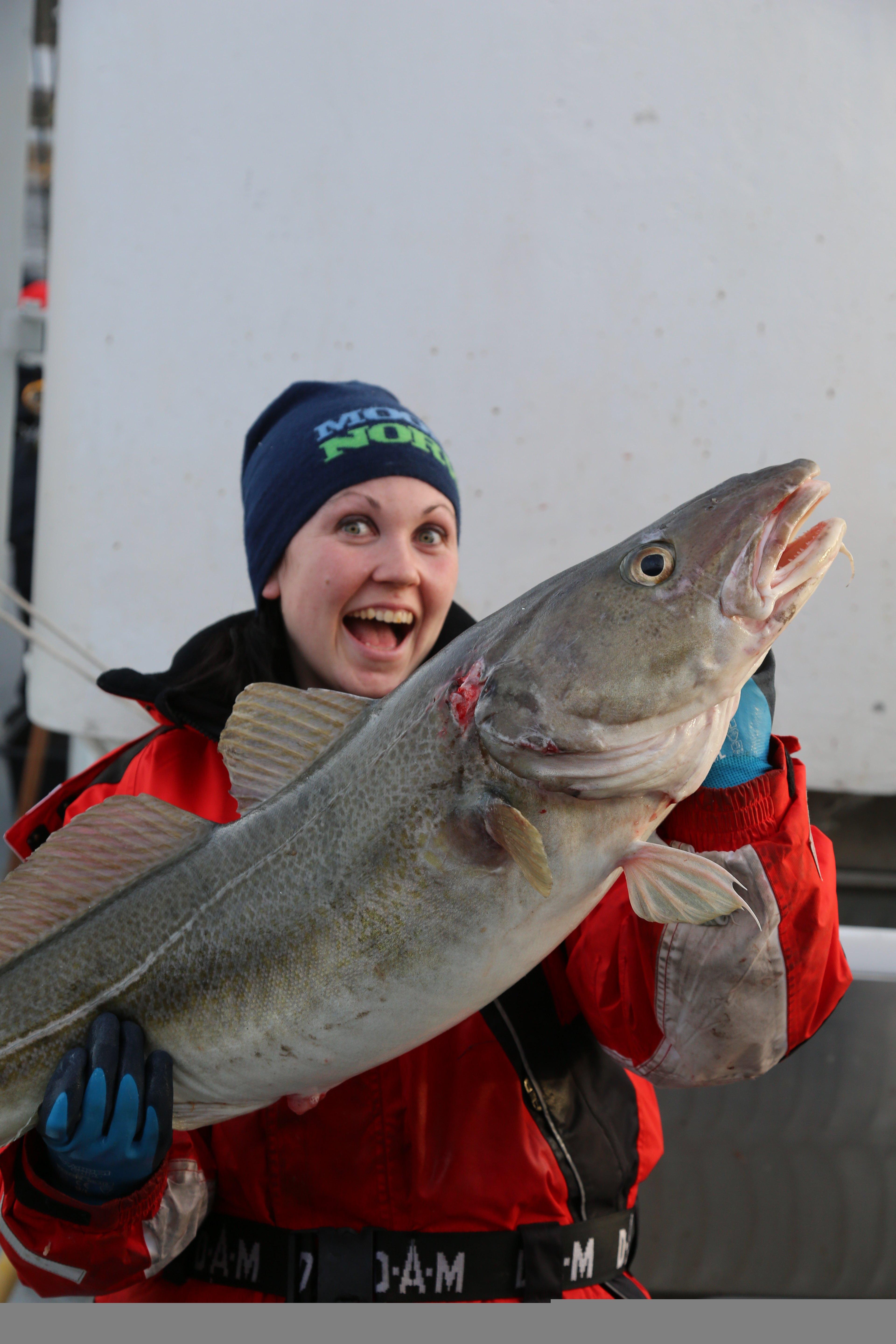Woman fishing in Borgundfjorden
