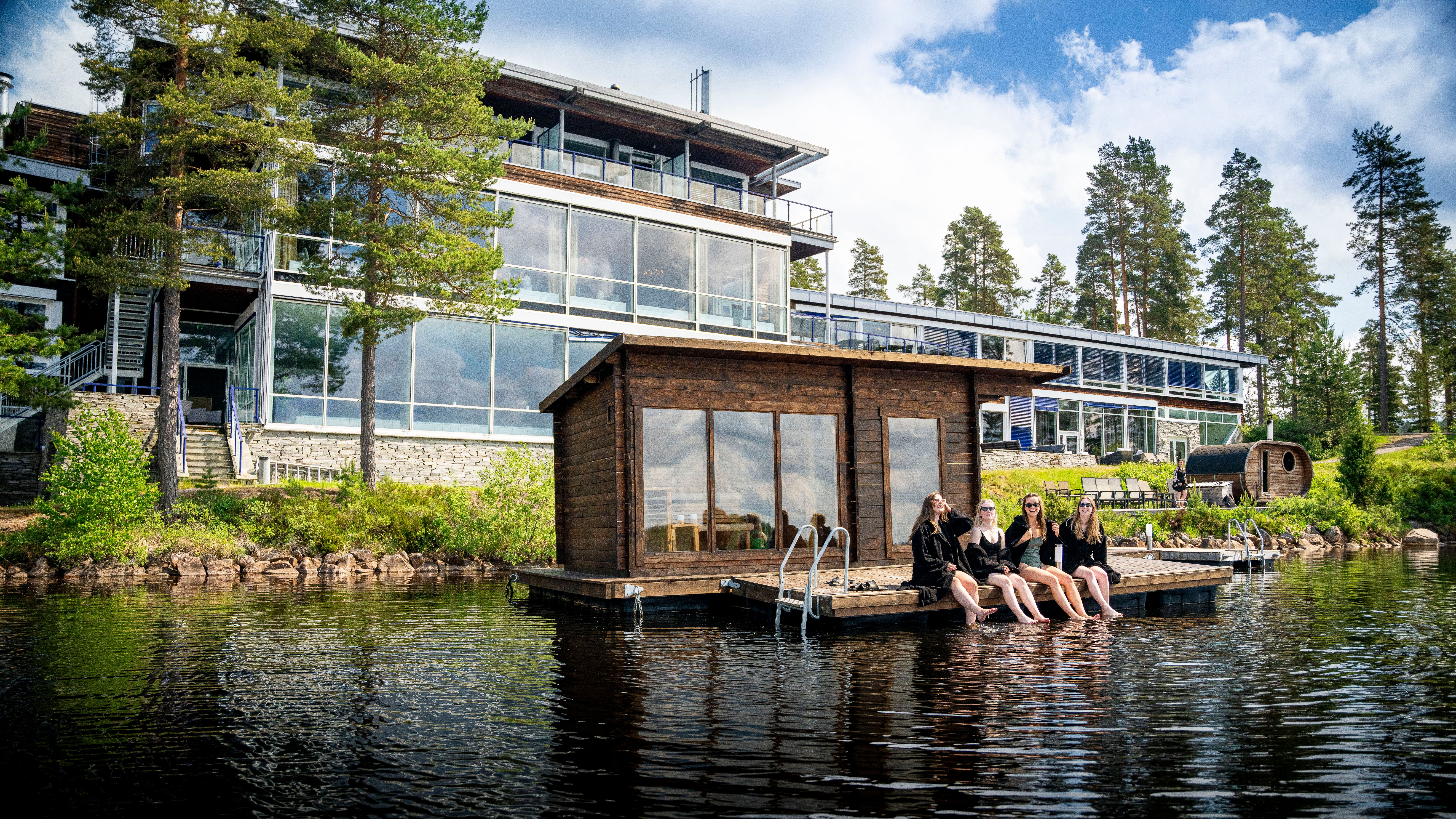 Women enjoying the floating sauna at Rømskog Spa & Resort