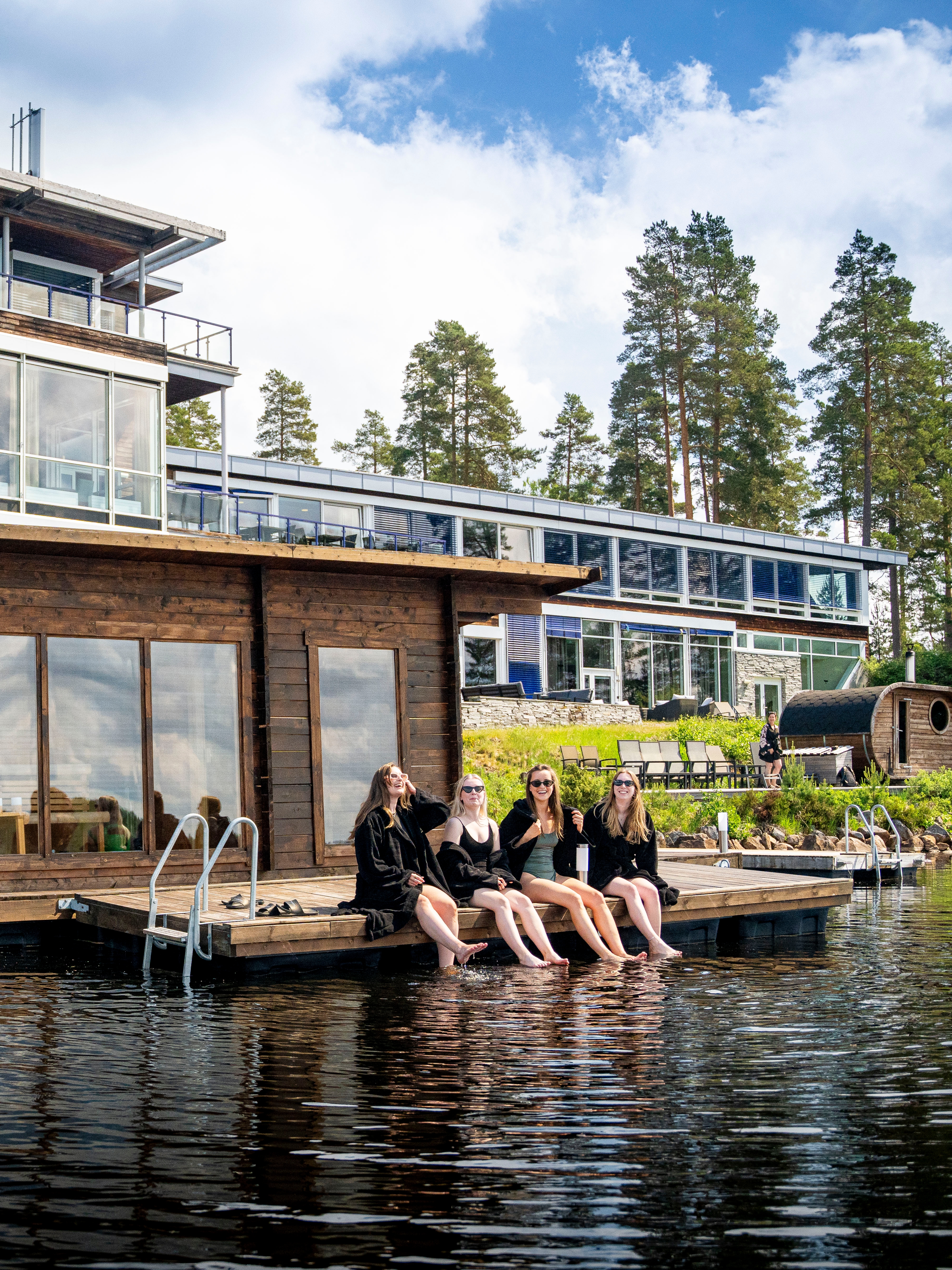 Women enjoying the floating sauna at Rømskog Spa & Resort