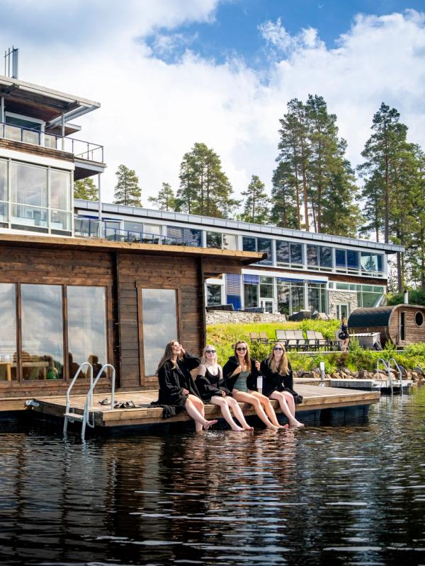 Women enjoying the floating sauna at Rømskog Spa & Resort