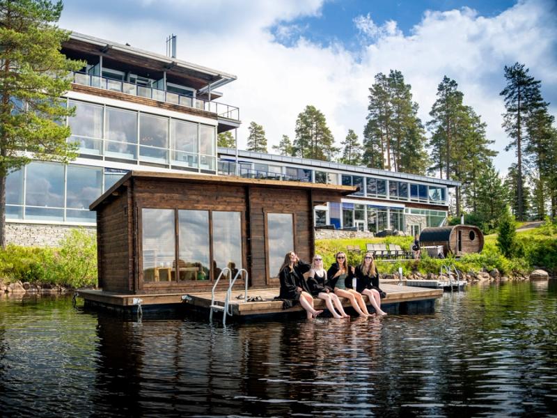 Women enjoying the floating sauna at Rømskog Spa & Resort