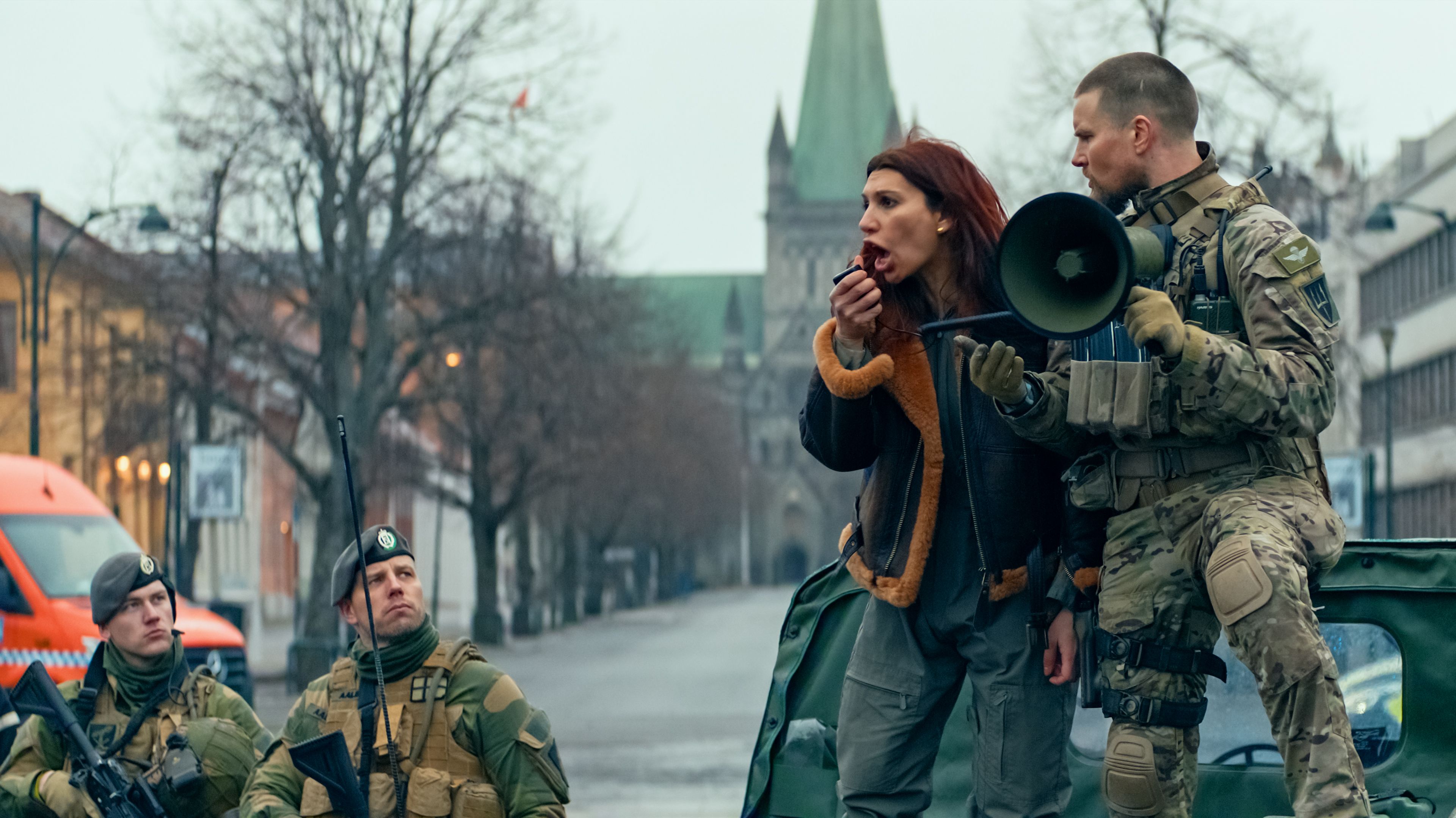 Characters from Troll 2 standing in front of Nidaros Cathedral in Trondheim.
