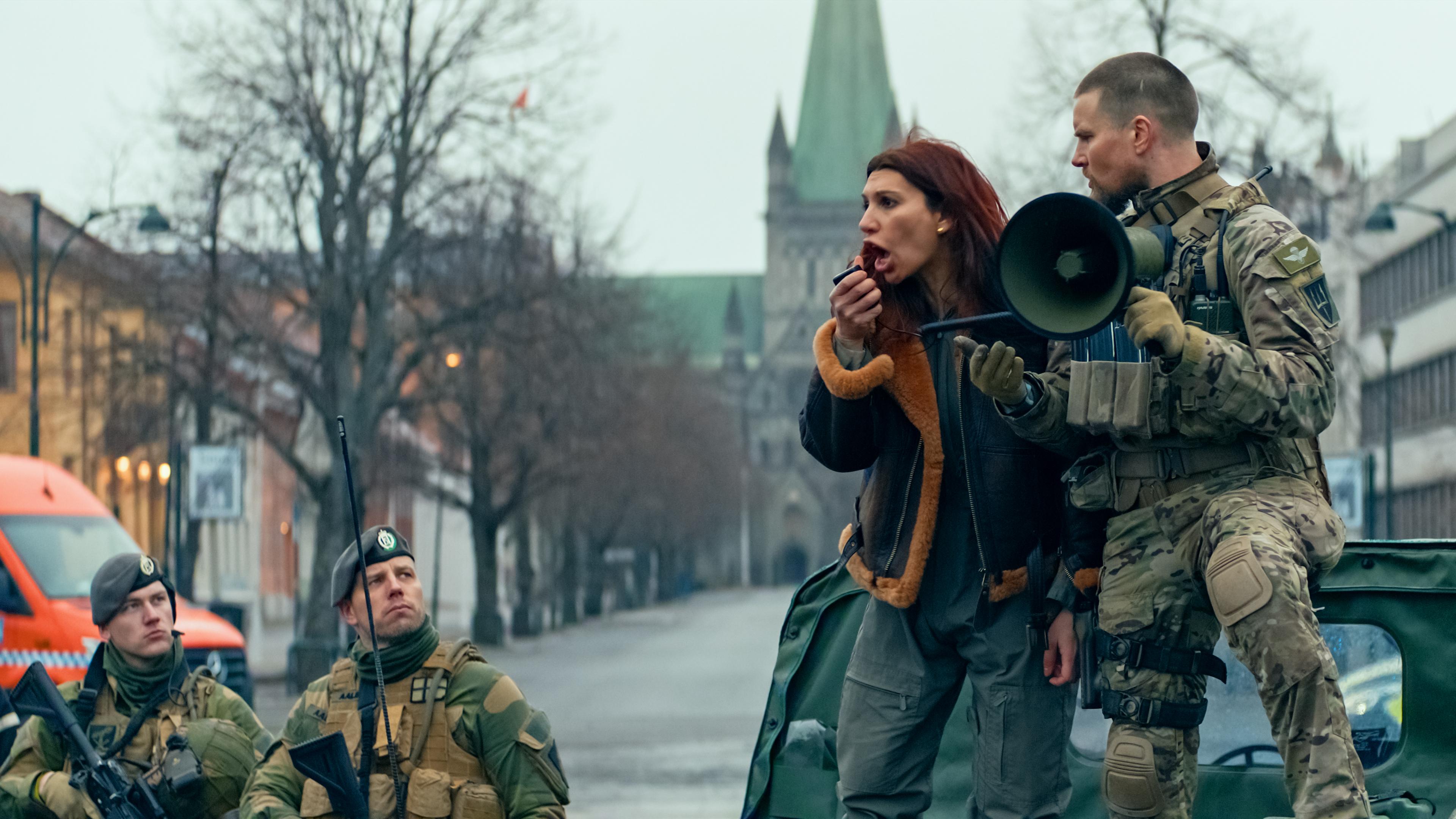 Characters from Troll 2 standing in front of Nidaros Cathedral in Trondheim.