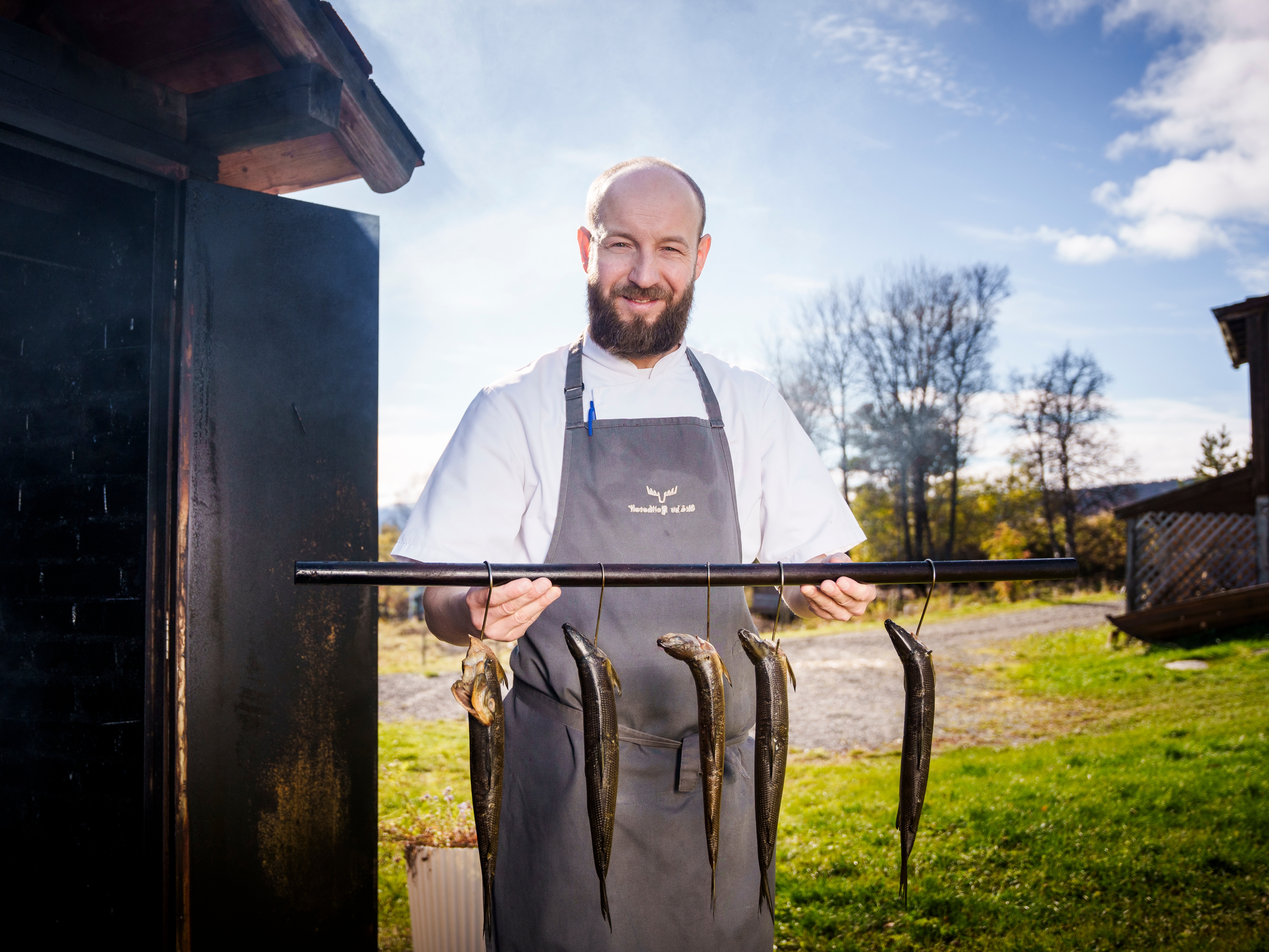 Chef Lukasz B. Socha outside of Skåbu fjellhotell, Skåbu Mountain Hotel.