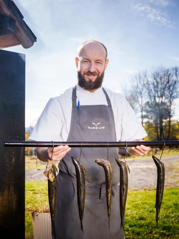Chef Lukasz B. Socha outside of Skåbu fjellhotell, Skåbu Mountain Hotel.