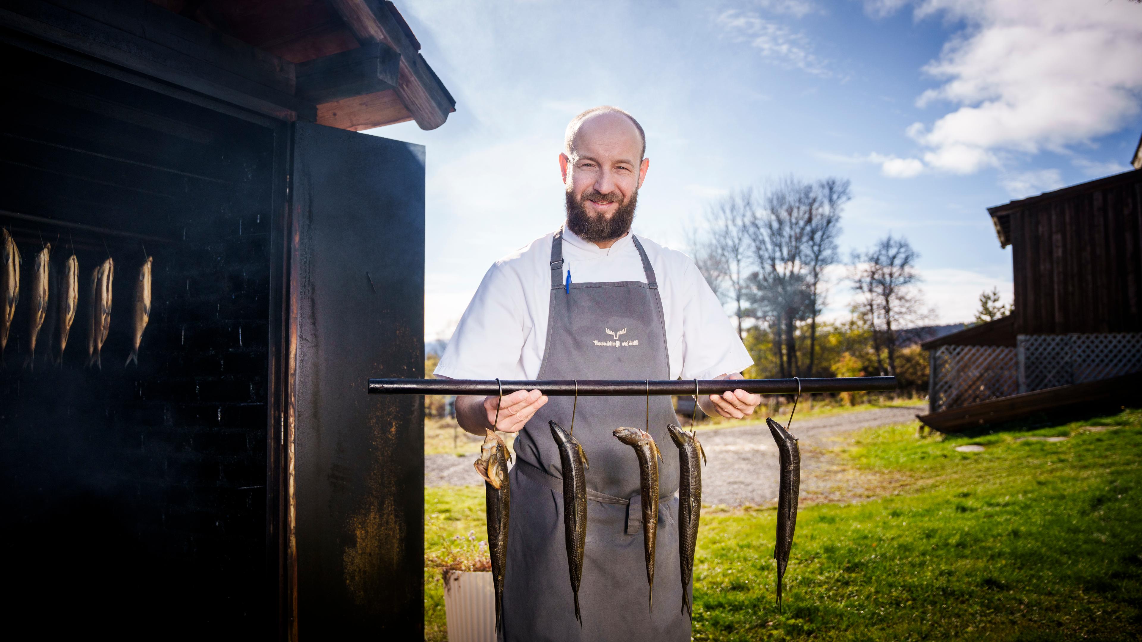 Chef Lukasz B. Socha outside of Skåbu fjellhotell, Skåbu Mountain Hotel.