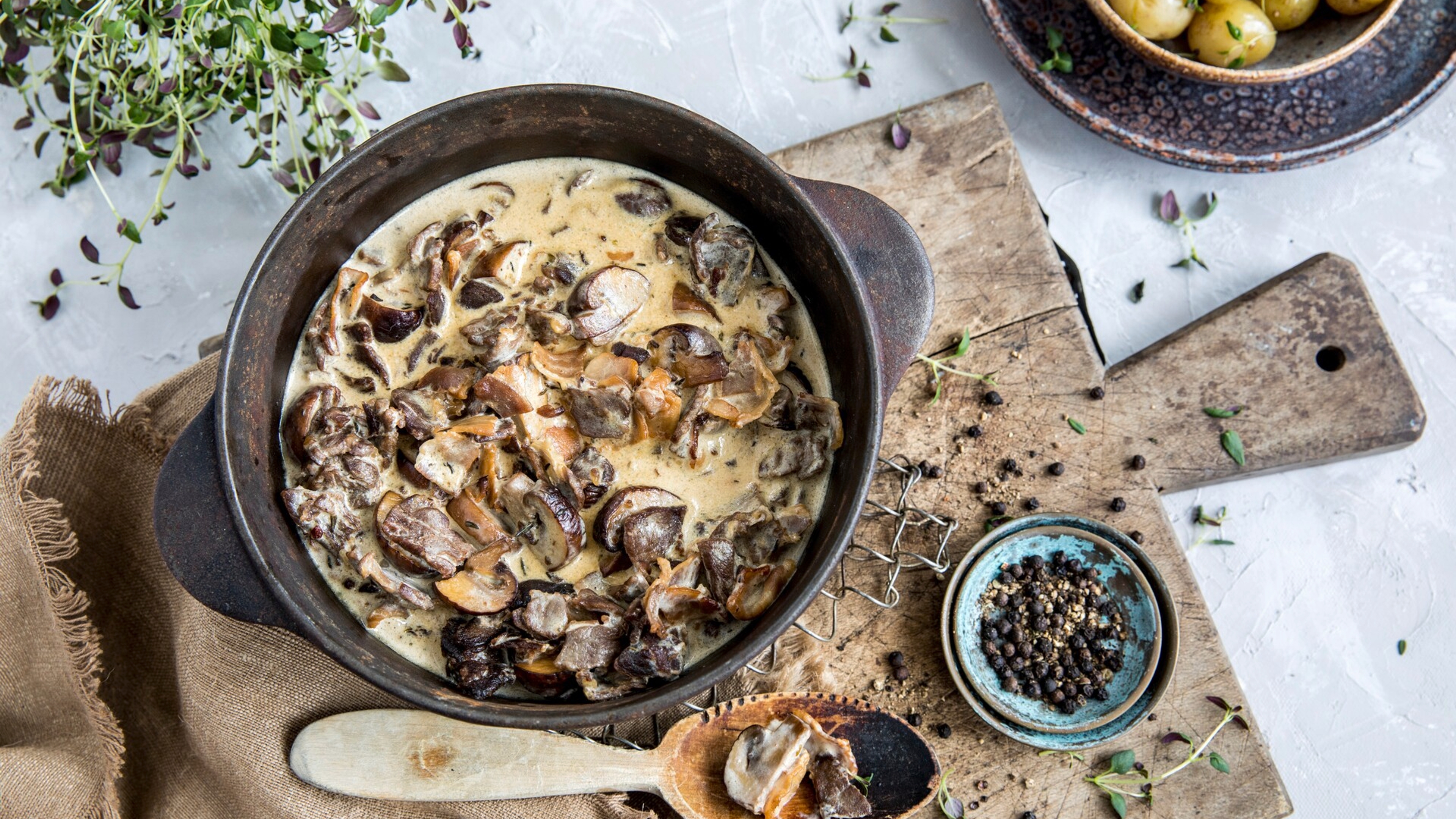 Reindeer stew in a pot on a table.