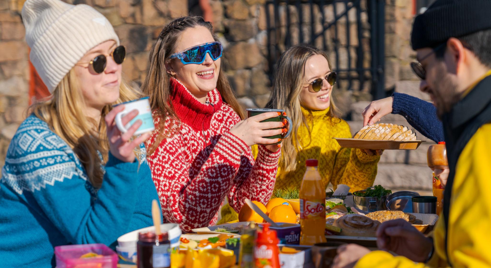 Friends having a meal at Grefsenkollen in Oslo, Eastern Norway