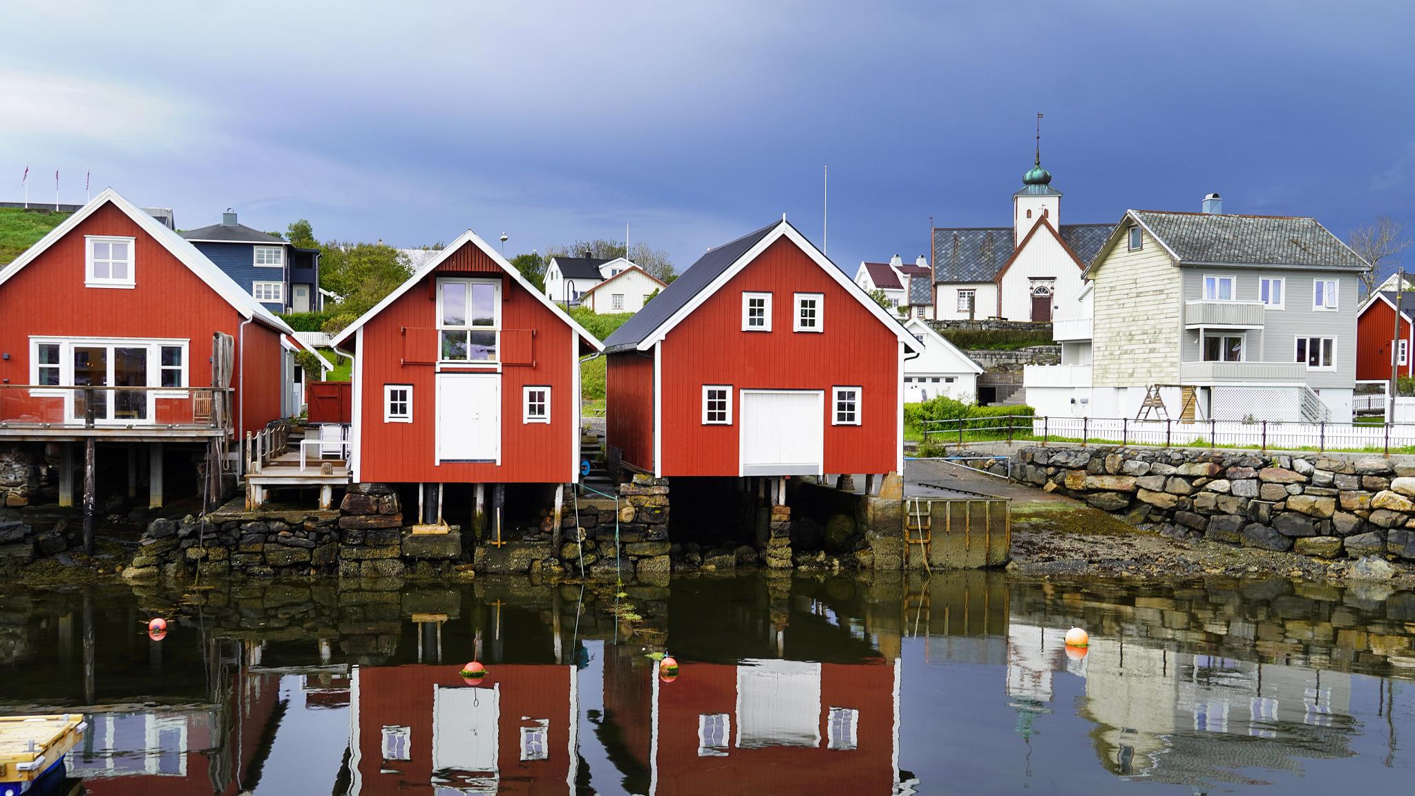 Wooden houses in the harbour in Bud fishing village.
