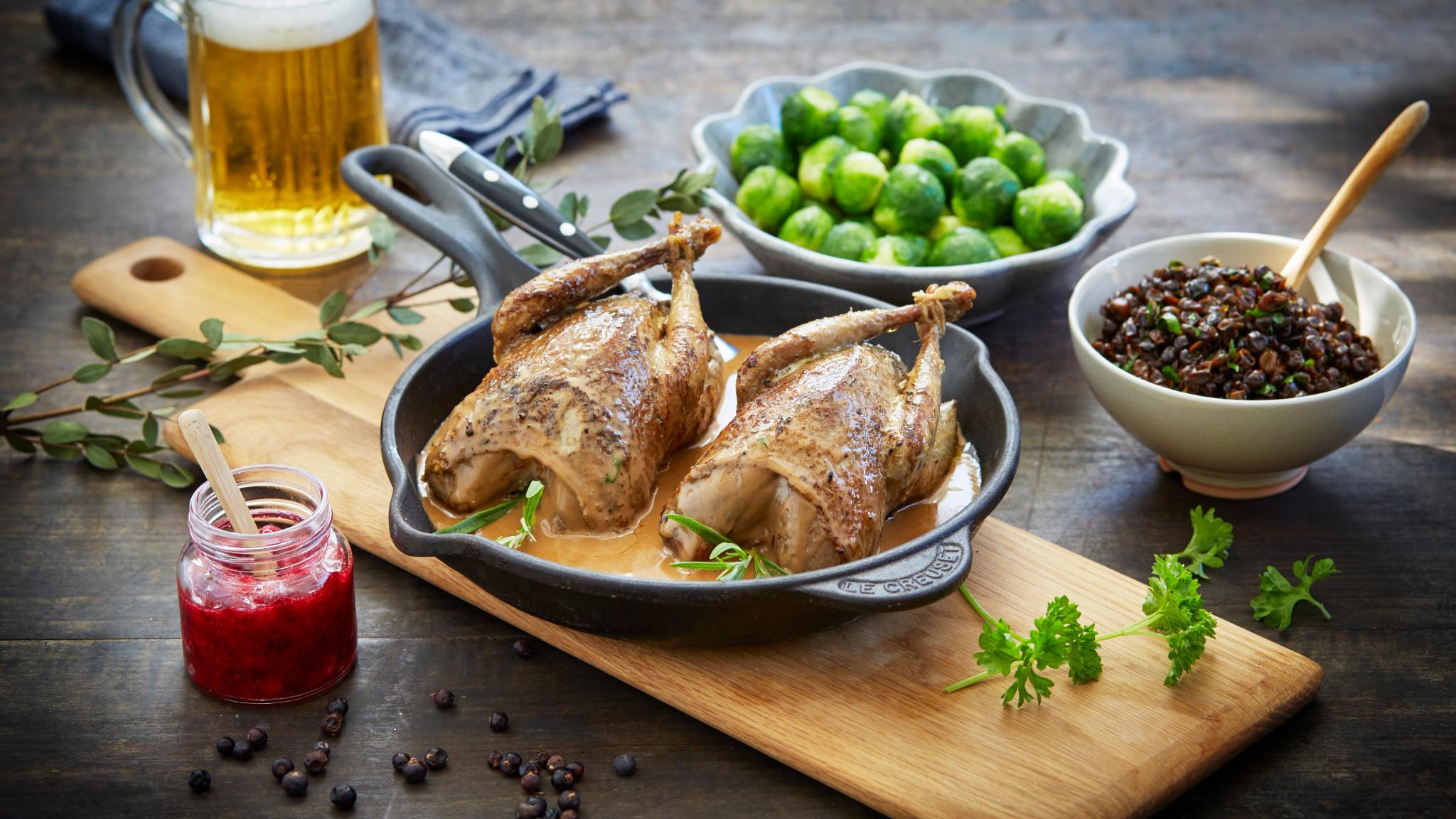 Traditional Norwegian grouse with creamed gravy, Brussels sprout, and lingonberry jam