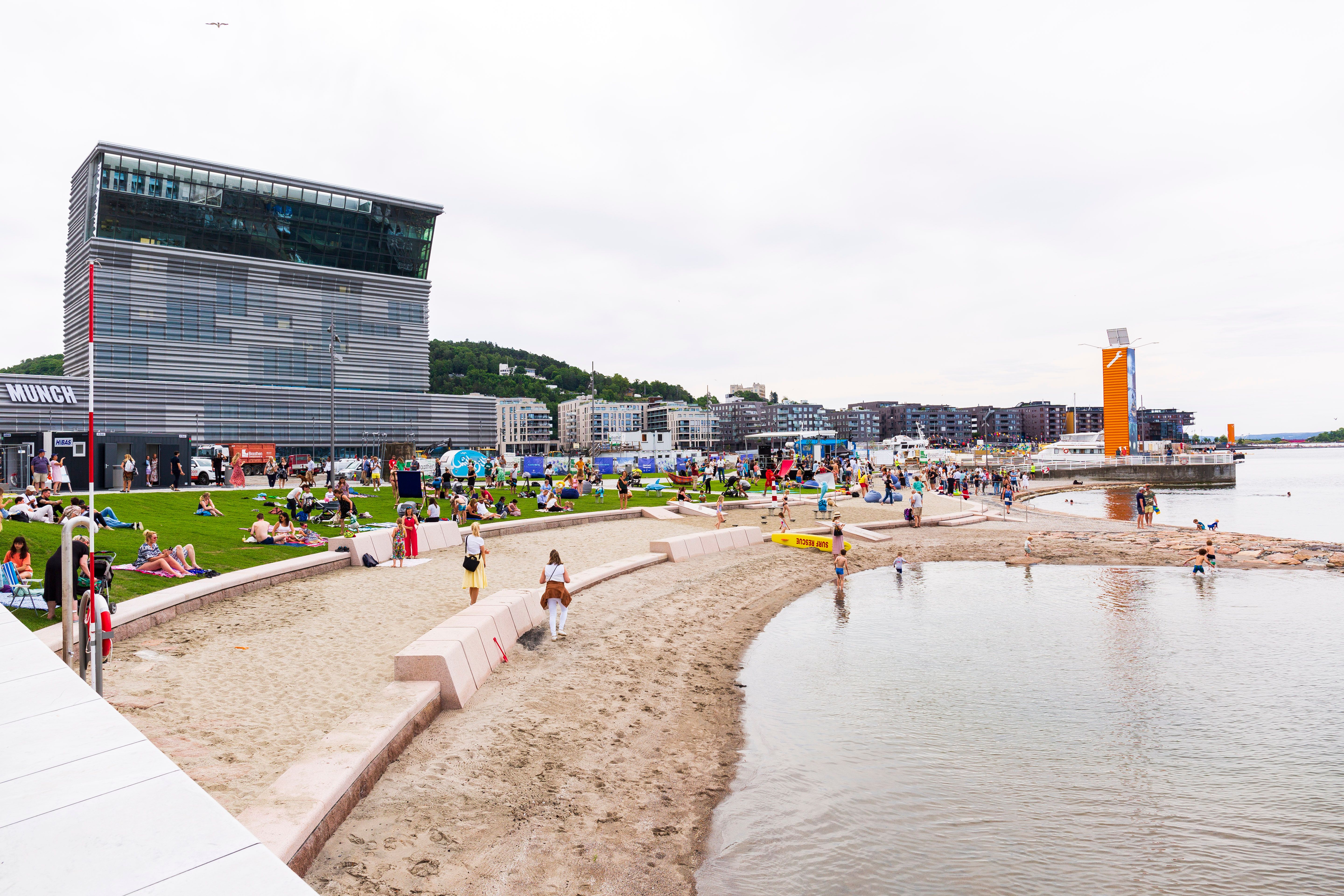 People at the Operastranda beach outside the Munch museum in Oslo, Eastern Norway