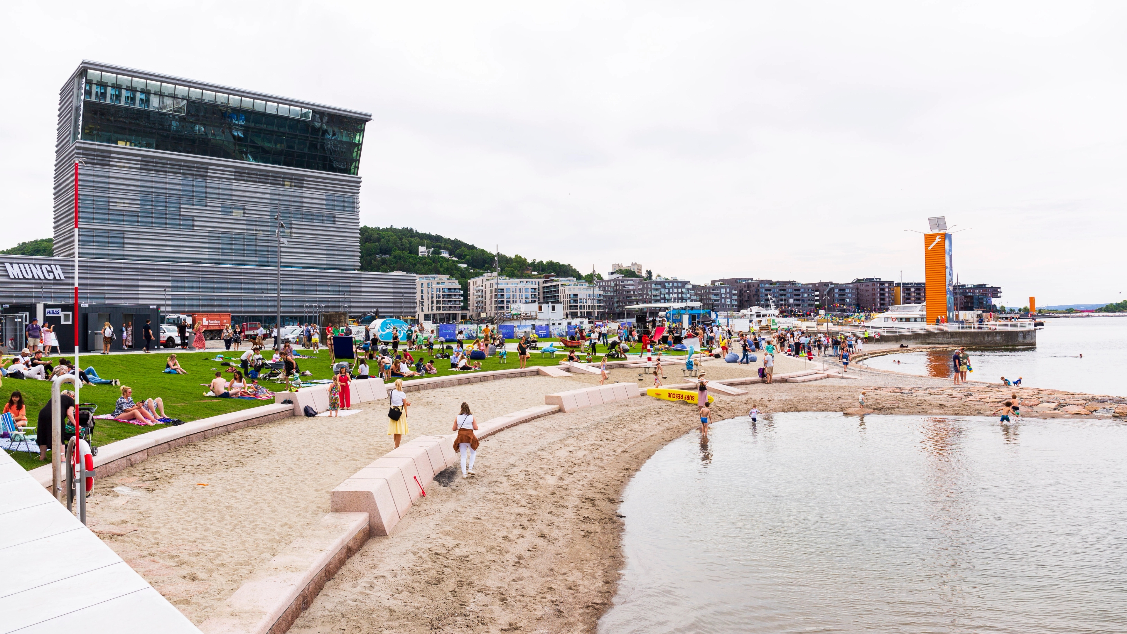People at the Operastranda beach outside the Munch museum in Oslo, Eastern Norway