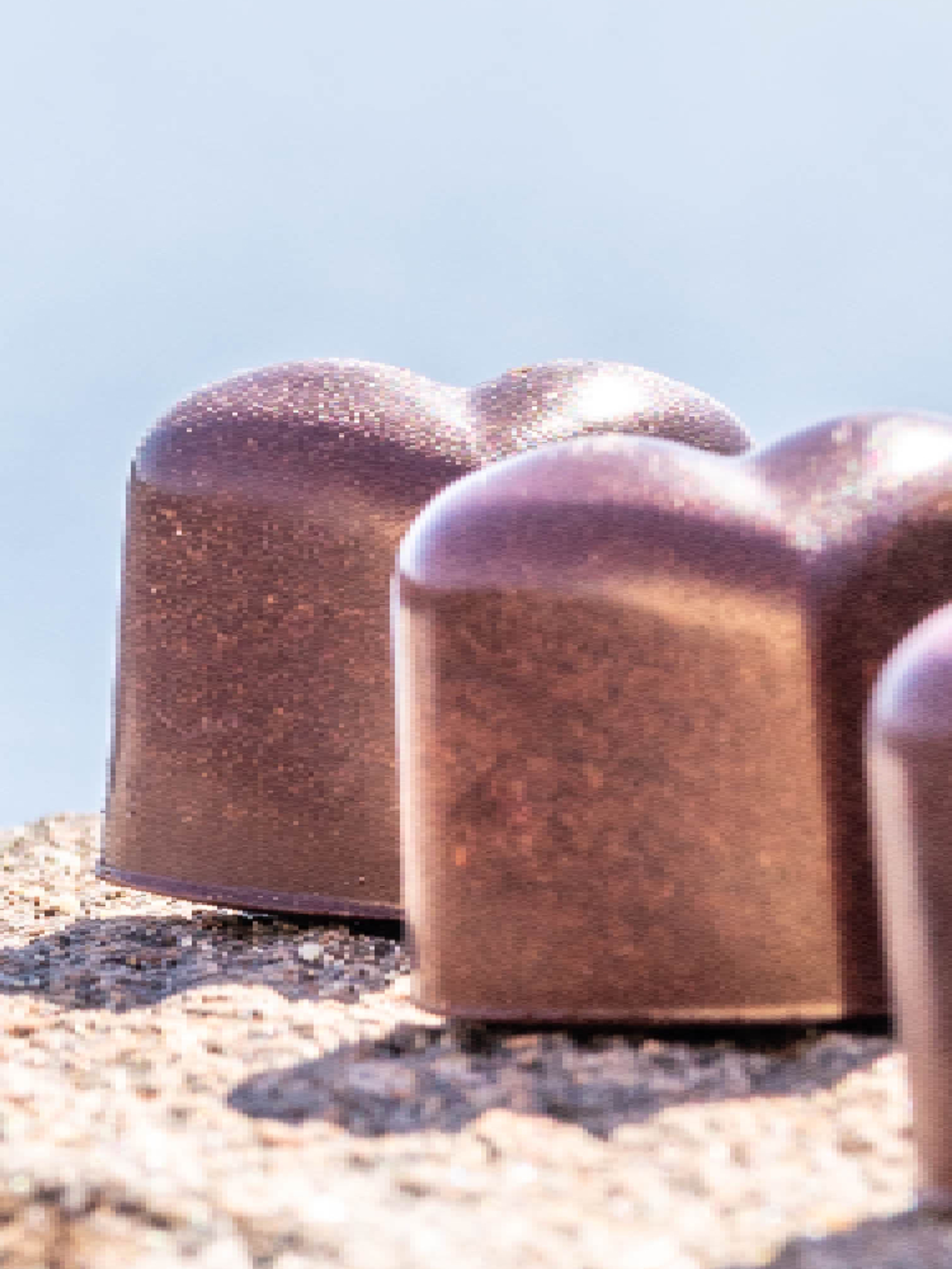 Chocolate confect and coffee.