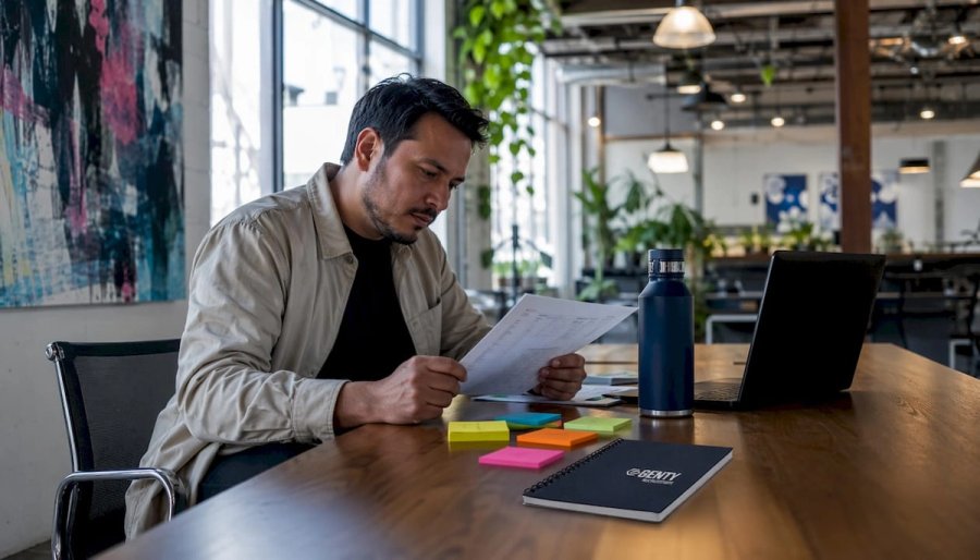 Engineer reviewing technical skills sheet