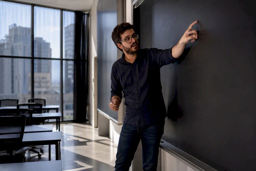 Tech classroom with instructor in coding bootcamp
